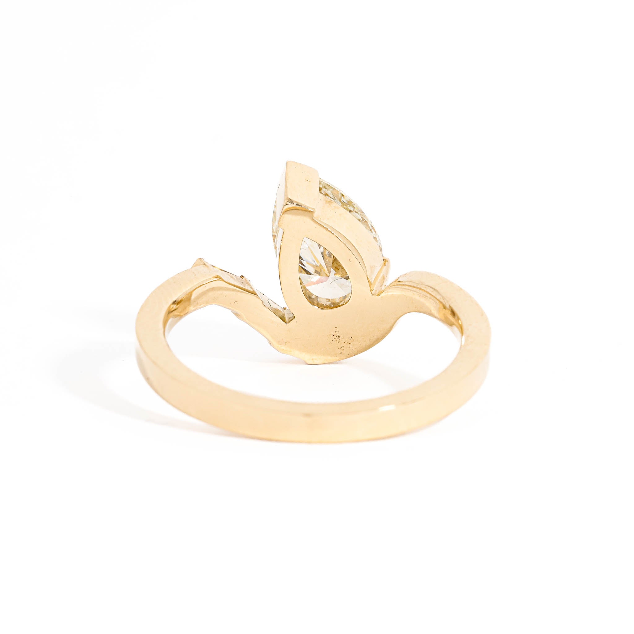 Pear Cut and Baguette Cut White Diamond Engagement Ring in 18 Carat Yellow Gold