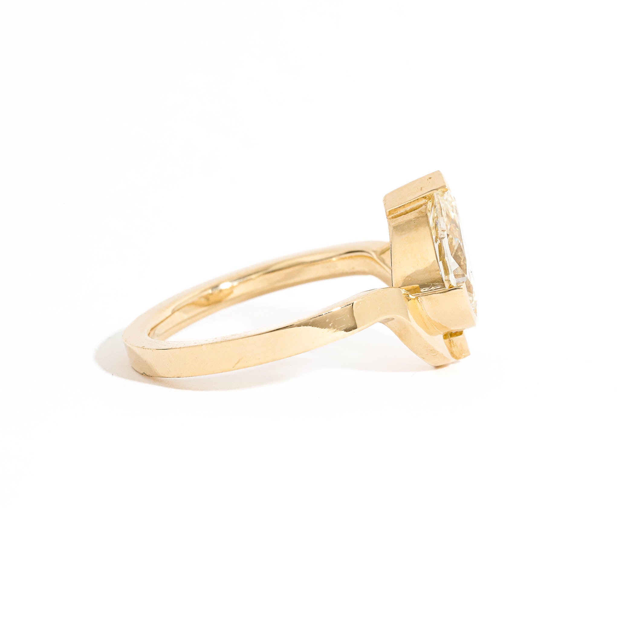 Pear Cut and Baguette Cut White Diamond Engagement Ring in 18 carat Yellow Gold