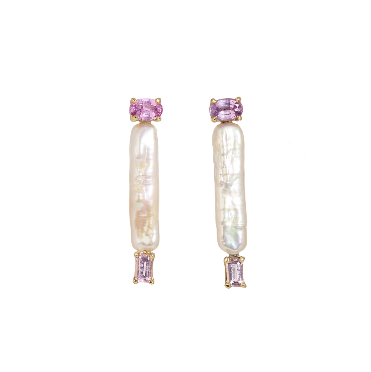 A pair of gold drop earrings featuring a vertical baroque pearl, accented with a pink oval-cut sapphire at the top and an emerald-cut pink sapphire at the bottom, set against a plain white background.
