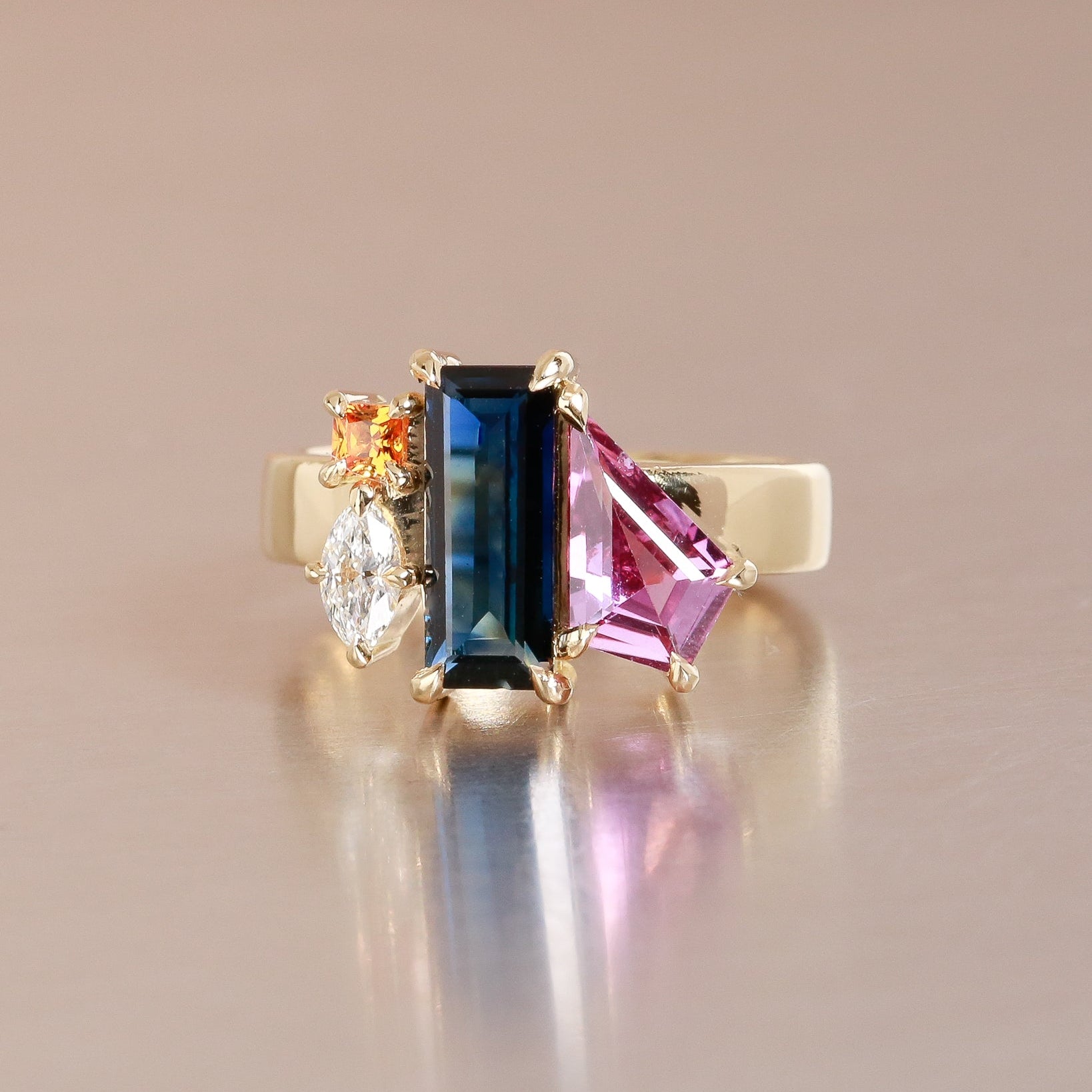 Geometric cluster Ring with multicolored sapphires