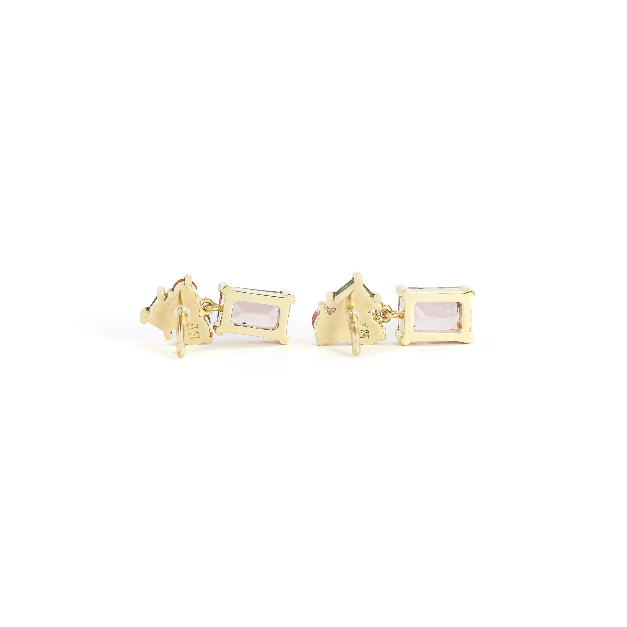 Pair of drop earrings with multicoloured gemstones on a white background