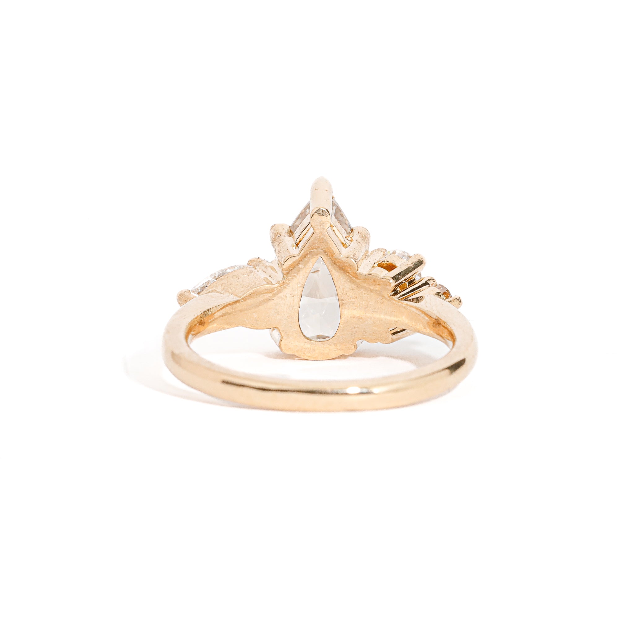 Pear Cut Champagne Diamond with Pear and Round Brilliant Cut White Diamond Side Stones in 18 Carat Yellow Gold