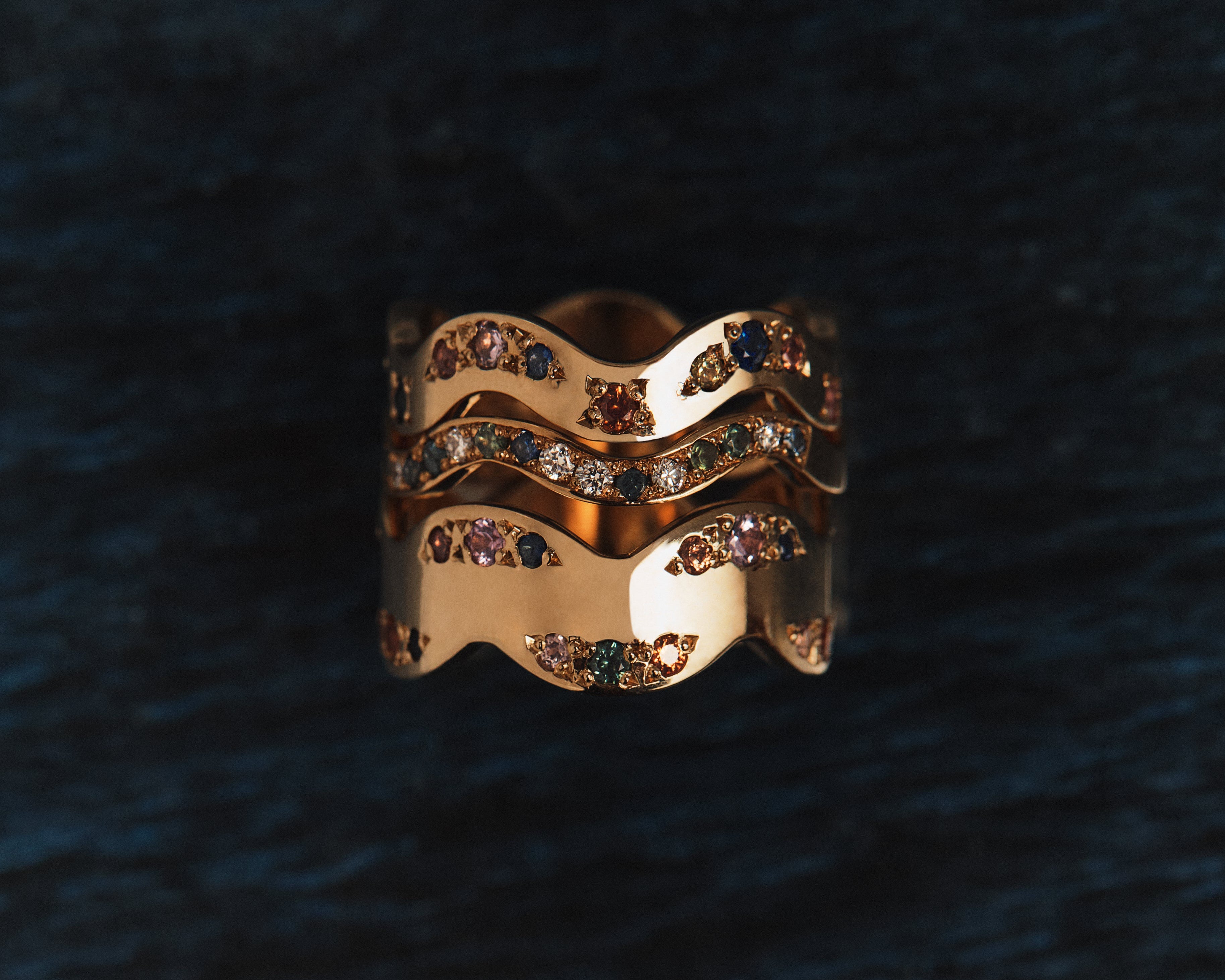 wavy rings stack on ocean background