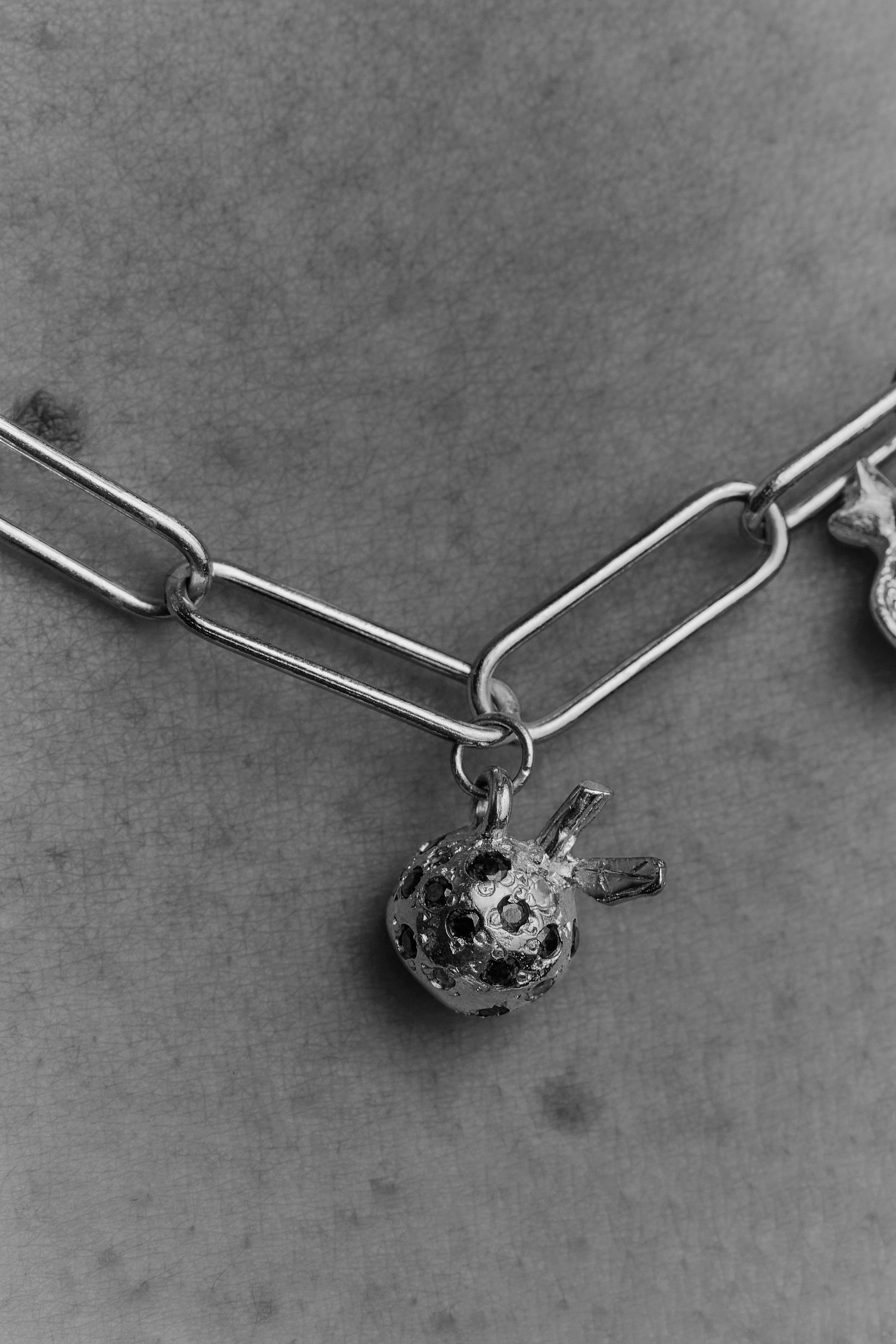 gold apple charm on chain