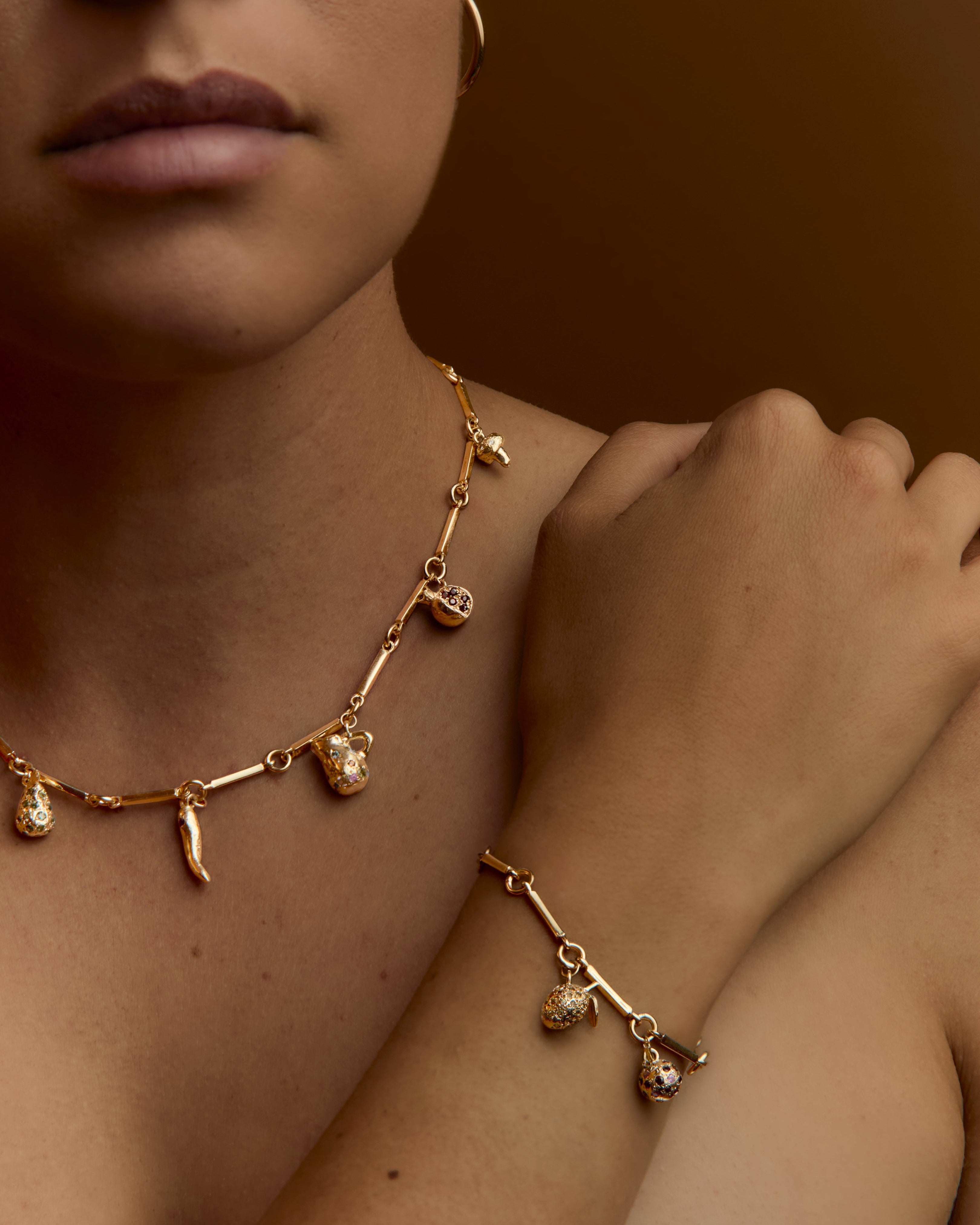 gold jug charm necklace