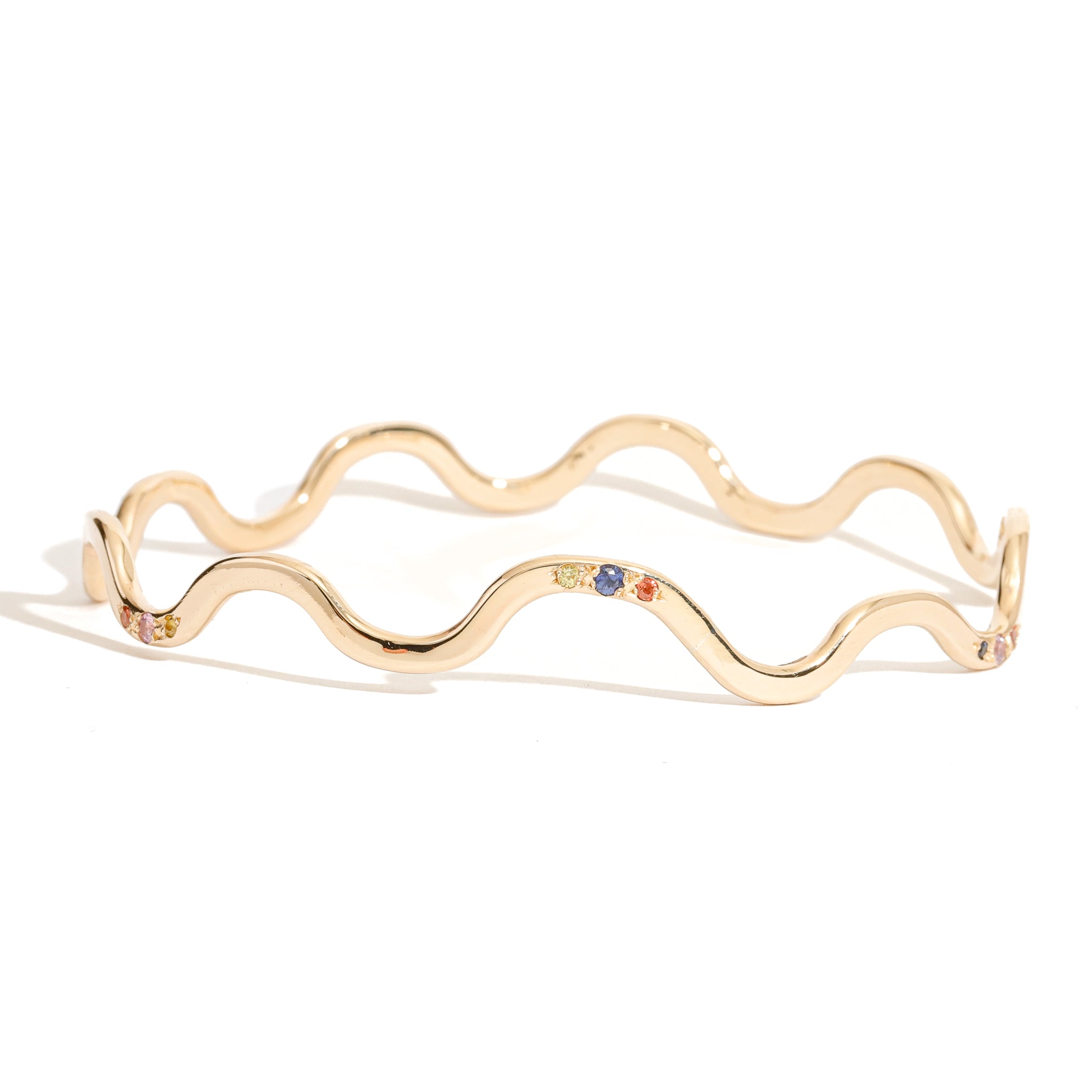 9 carat yellow gold wavy bangle clusters mixed coloured sapphires