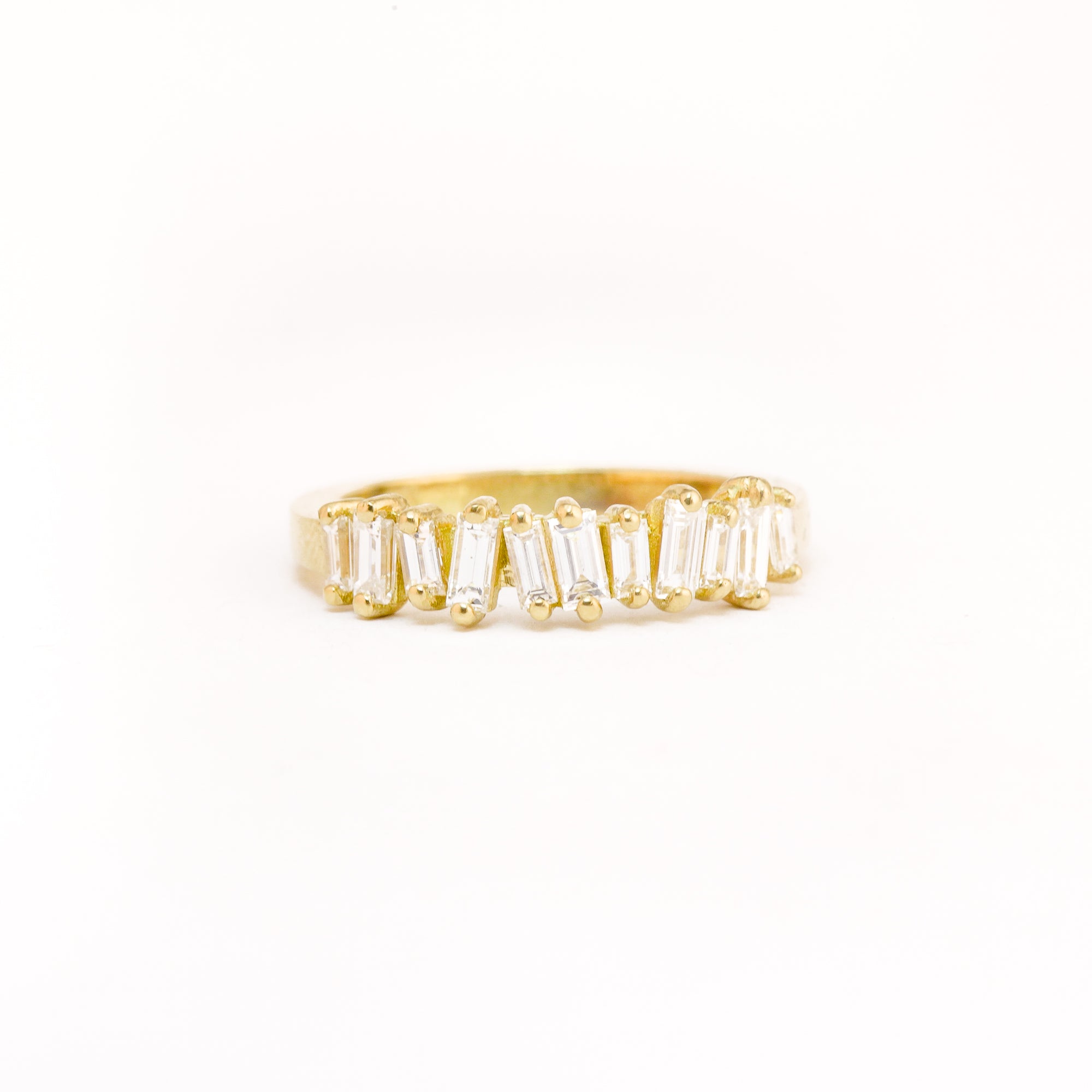 Made in Melbourne, bespoke line up of diamonds in row in an 18ct yellow band. 