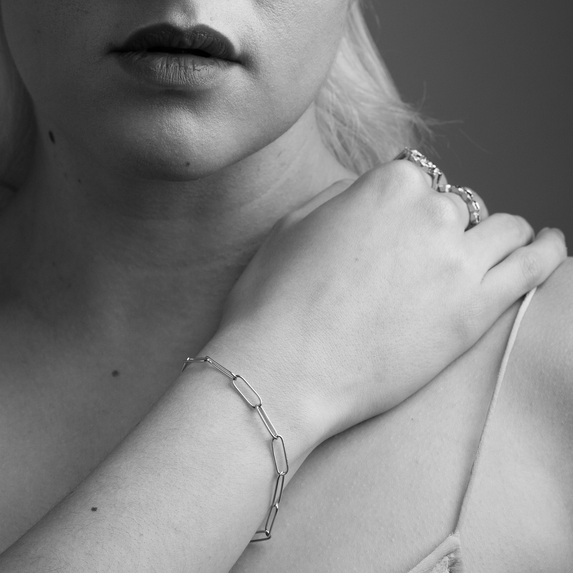 Elongated gold chain bracelet made by Black Finch Jewellery in Melbourne. Shown on model.