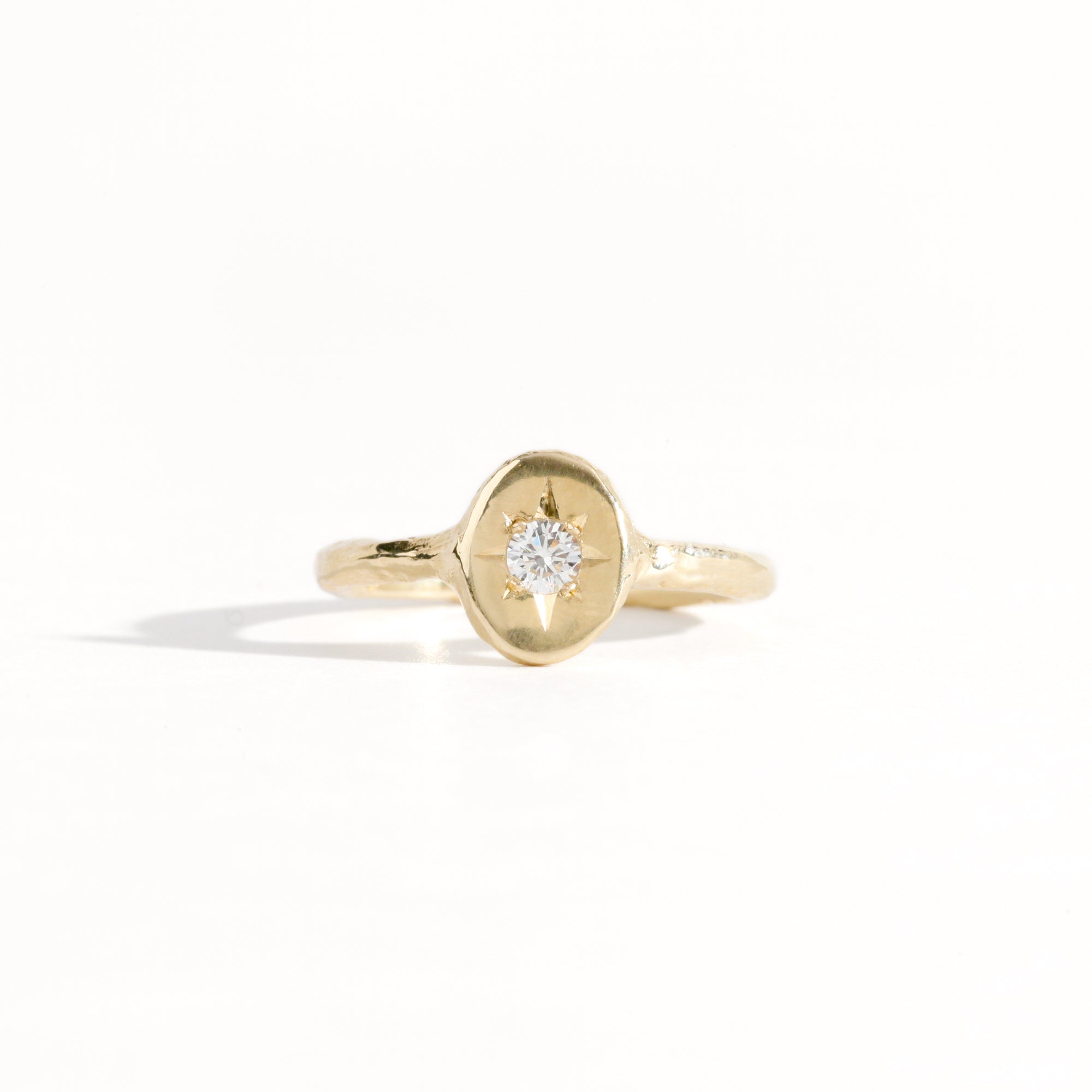 9ct yellow gold signet ring with star set diamond in centre. Bespoke and handmade in Melbourne by Black Finch Jewellery