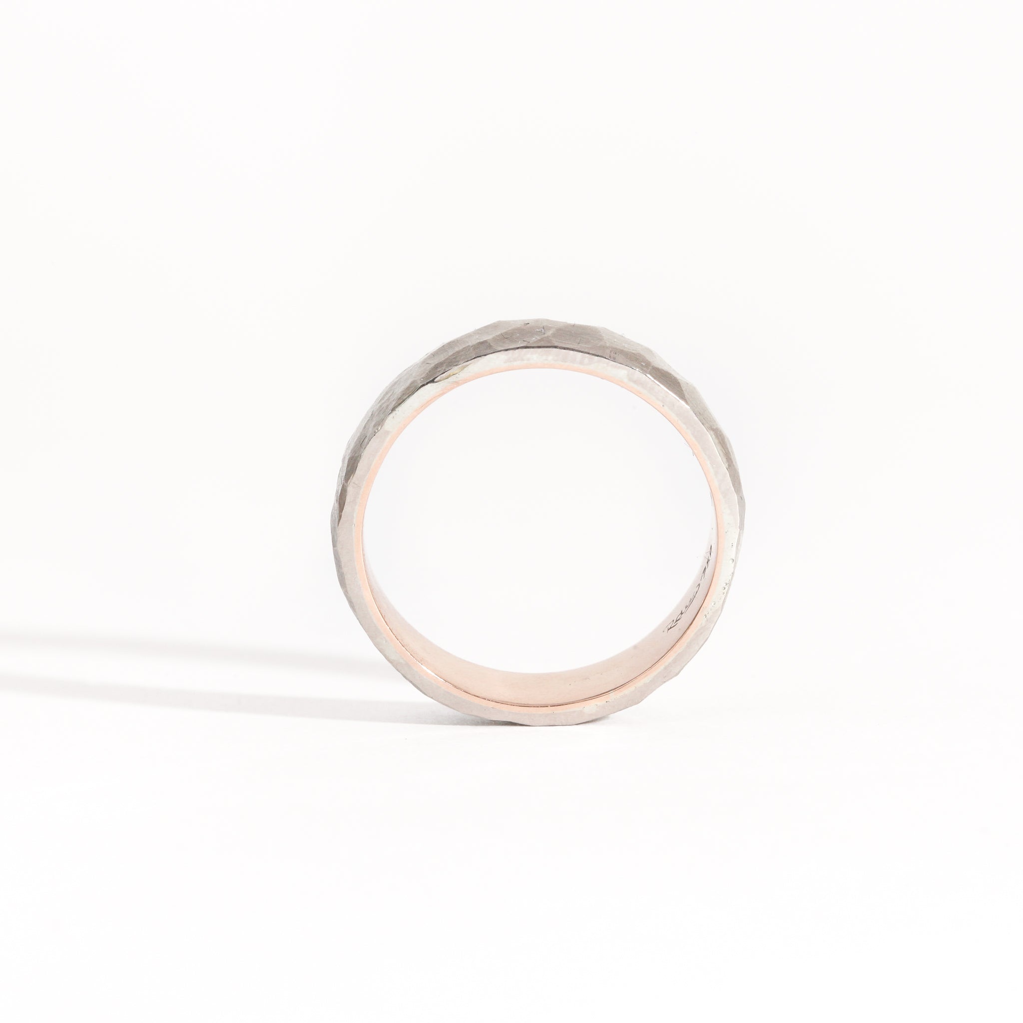 Hand finished 18ct rose gold sleeve with 18ct white gold exterior.