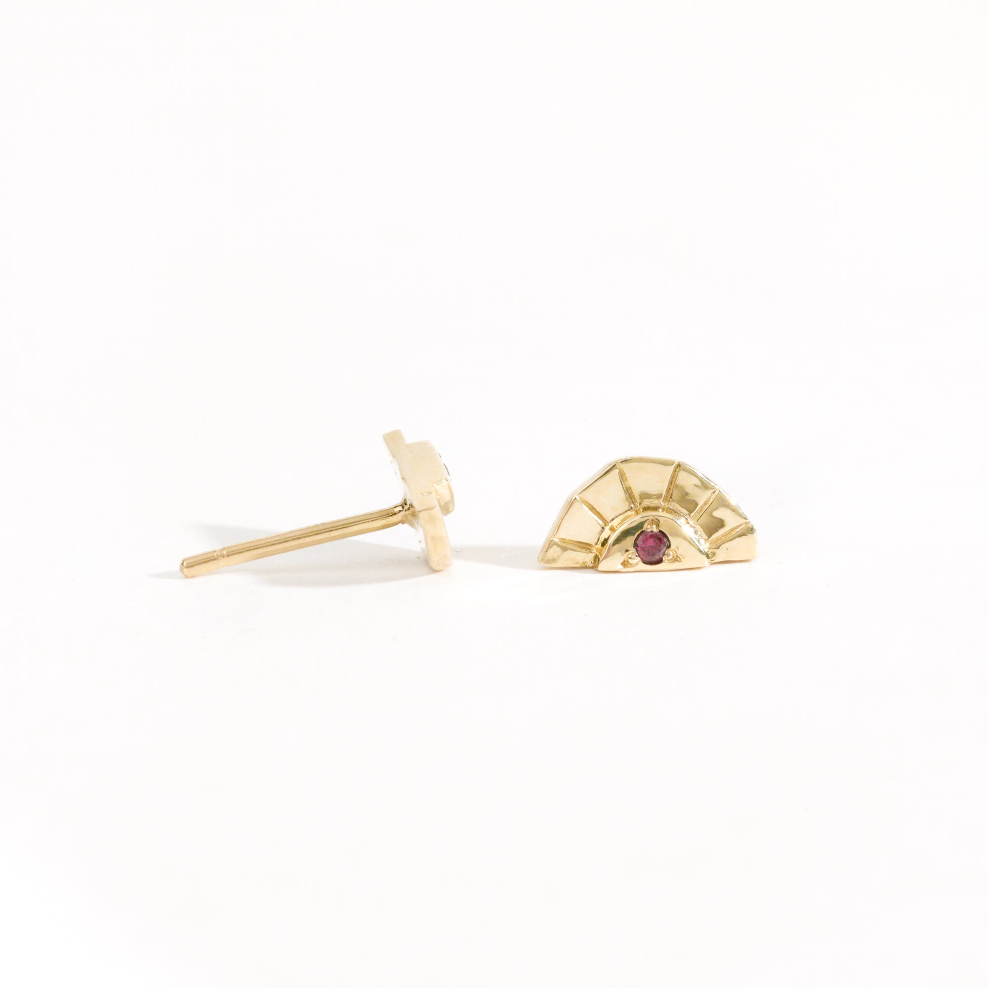 Rising sun earrings with centre red sapphire crafted in 9ct yellow gold by Black Finch Jewellery