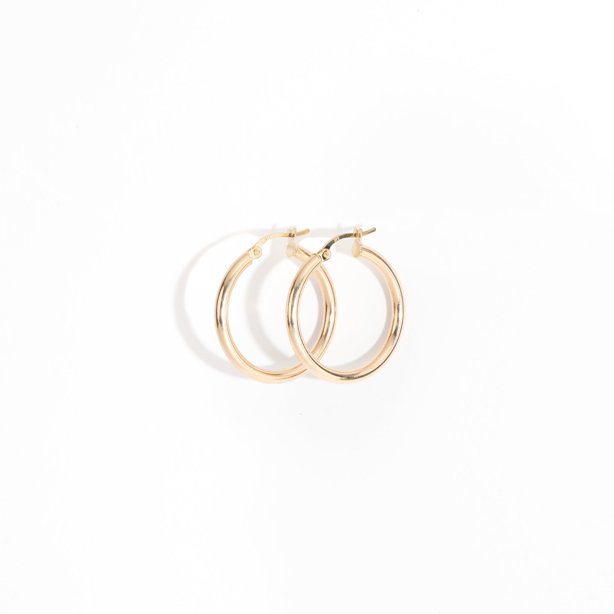 Classic 9 carat gold hoop earrings.