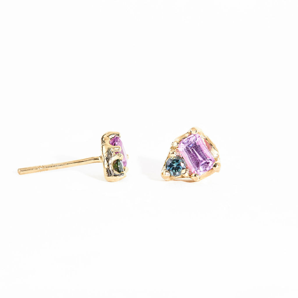 Two stone earrings with emerald cut pink sapphires and ethically sourced blue Australian sapphires crafted in 9ct yellow gold by Black Finch Jewelley