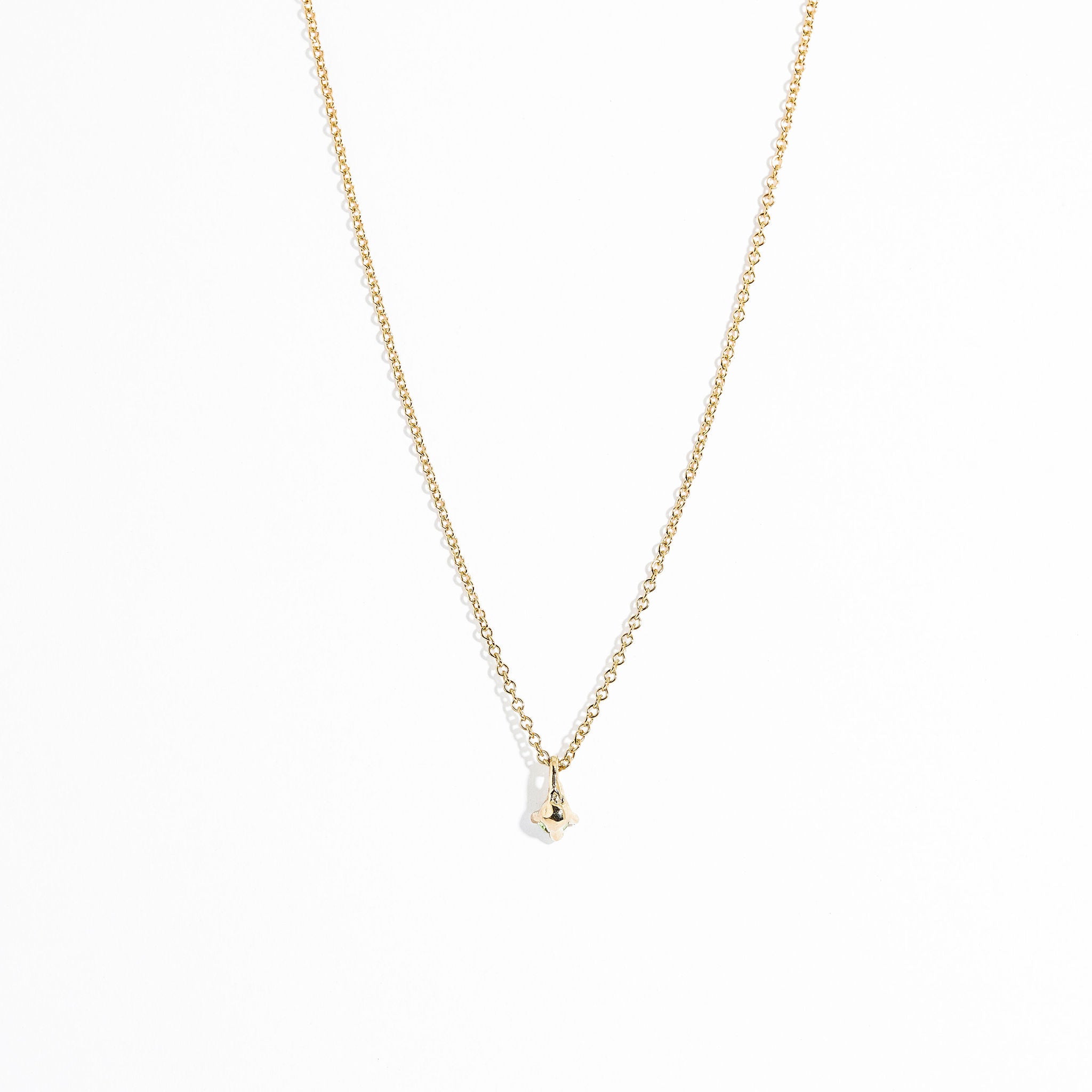 Single stone lilac Ceylon sapphire in claw setting 9ct yellow on chain. Hand made by Black Finch in Melbourne