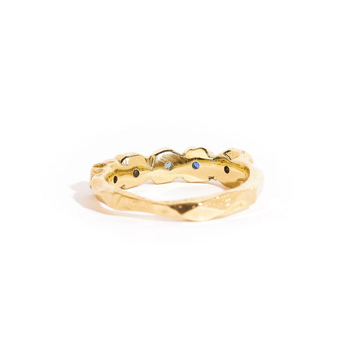 9 carat yellow gold handcrafted ring, featuring a row of five ethically sourced Australian blue sapphires. 