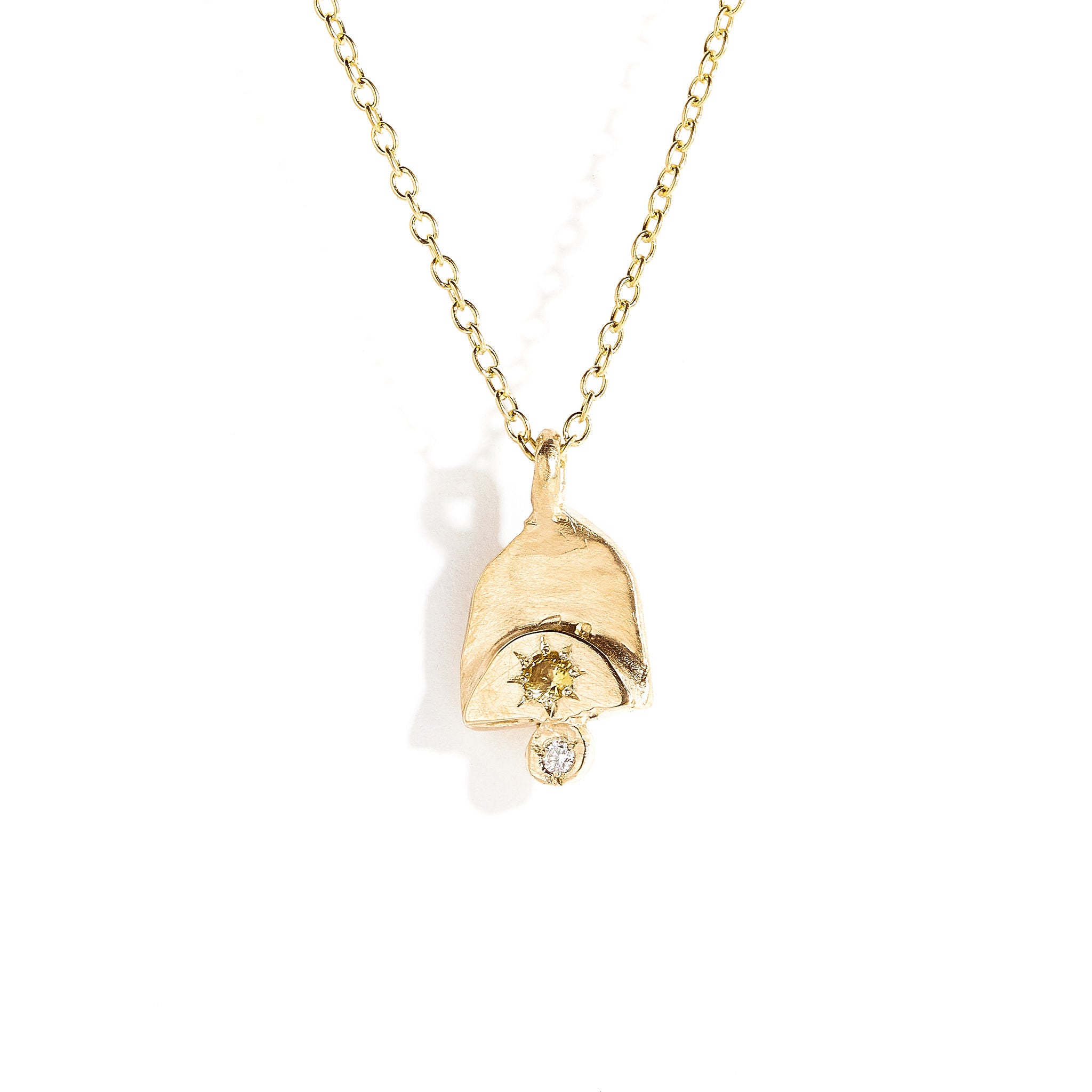 Yellow sapphire and white diamond pendant in 9 carat yellow gold.