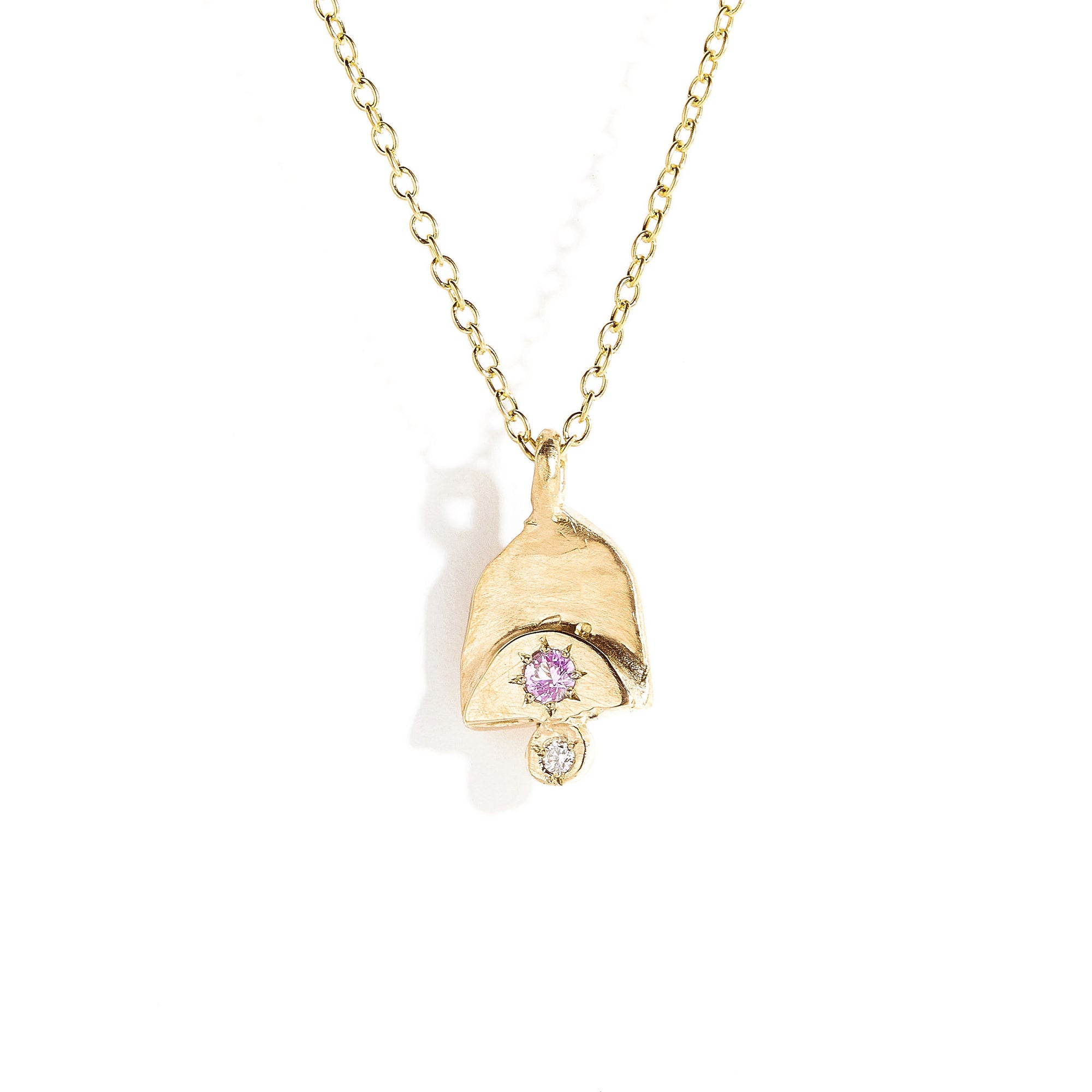 Pink sapphire and white diamond pendant in 9 carat yellow gold. 