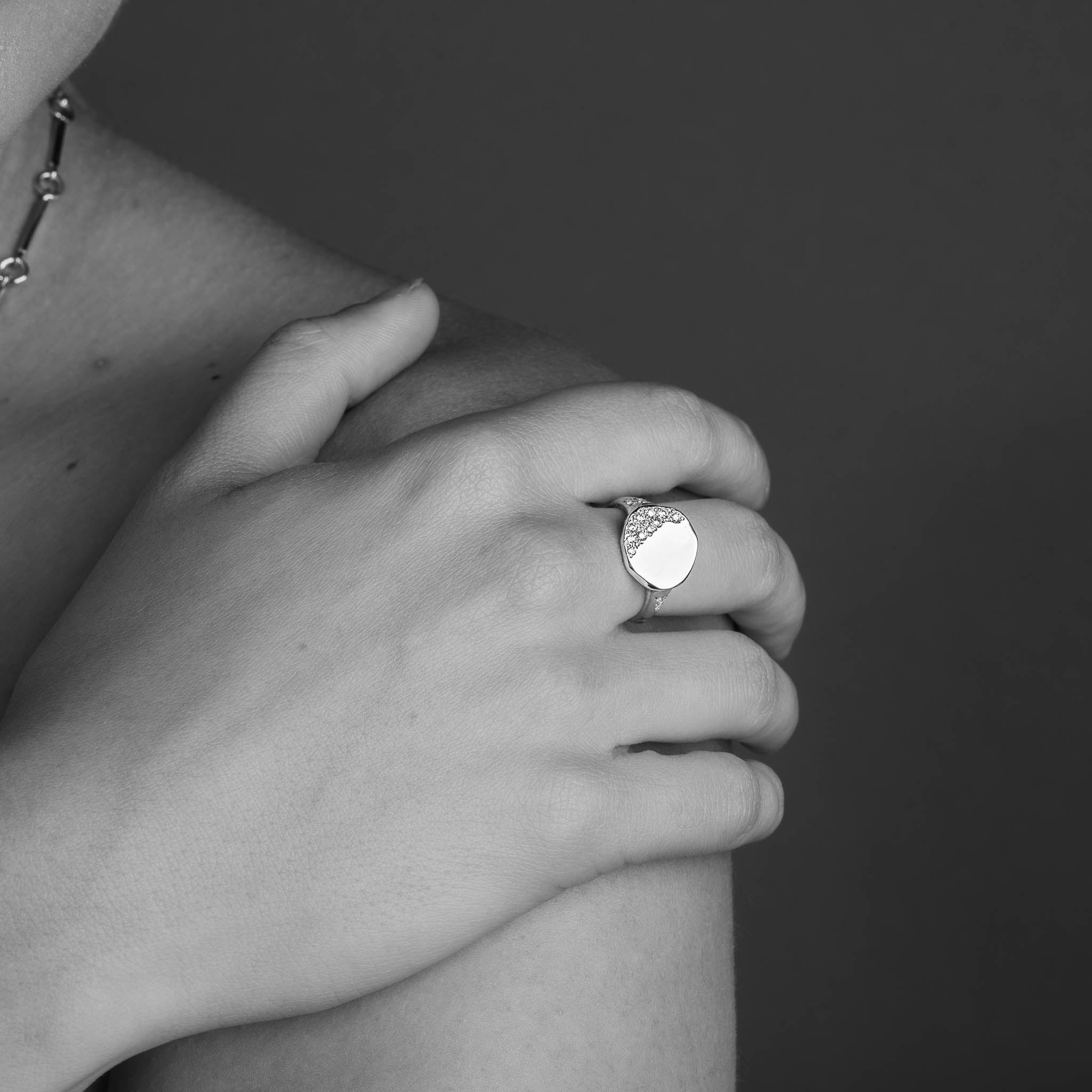 Round Signet Ring wth Pave Set White Diamond in 9 Carat Yellow Gold worn on the hand