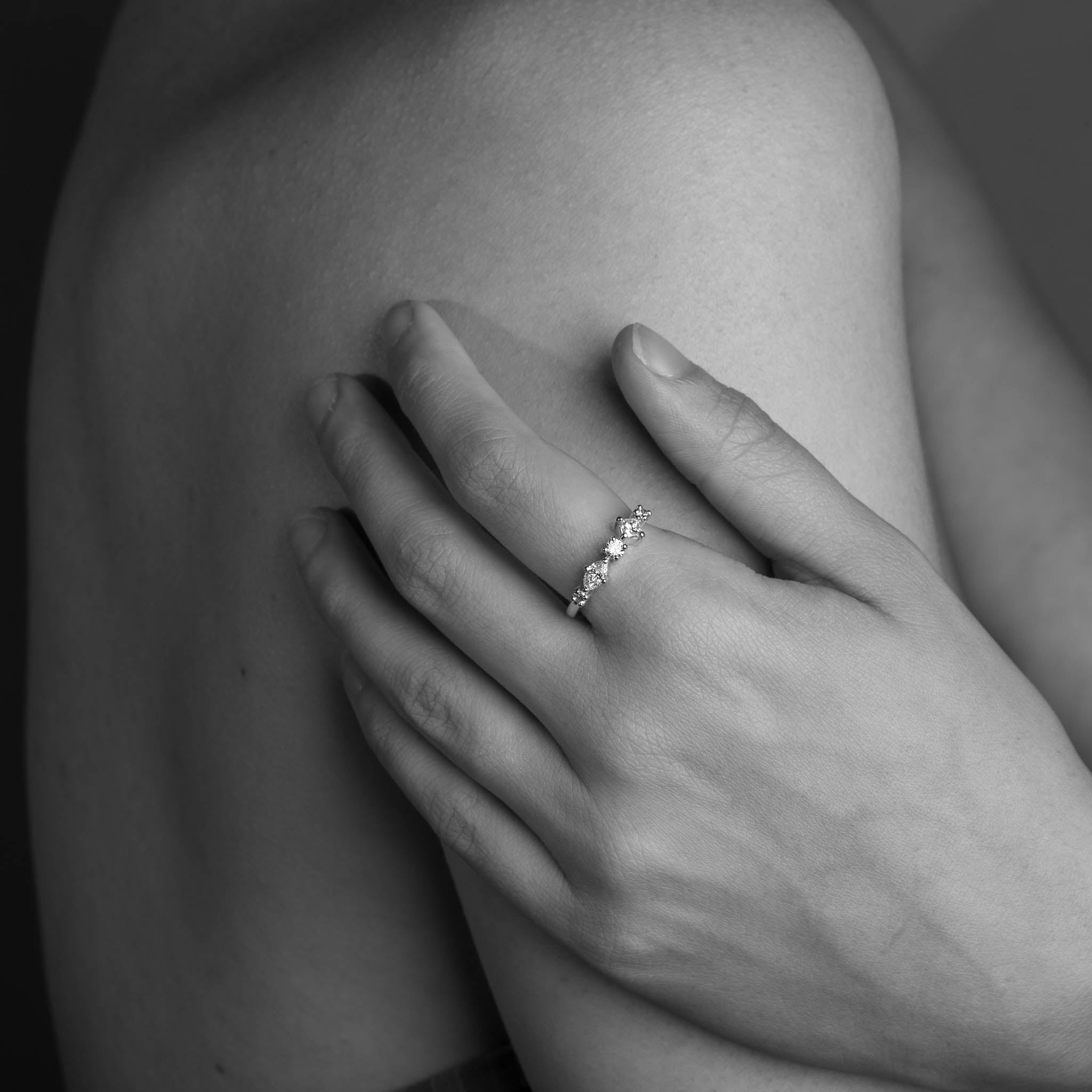 Five Stone White Diamond Engagement Ring in 18 Carat Yellow Gold worn on the hand