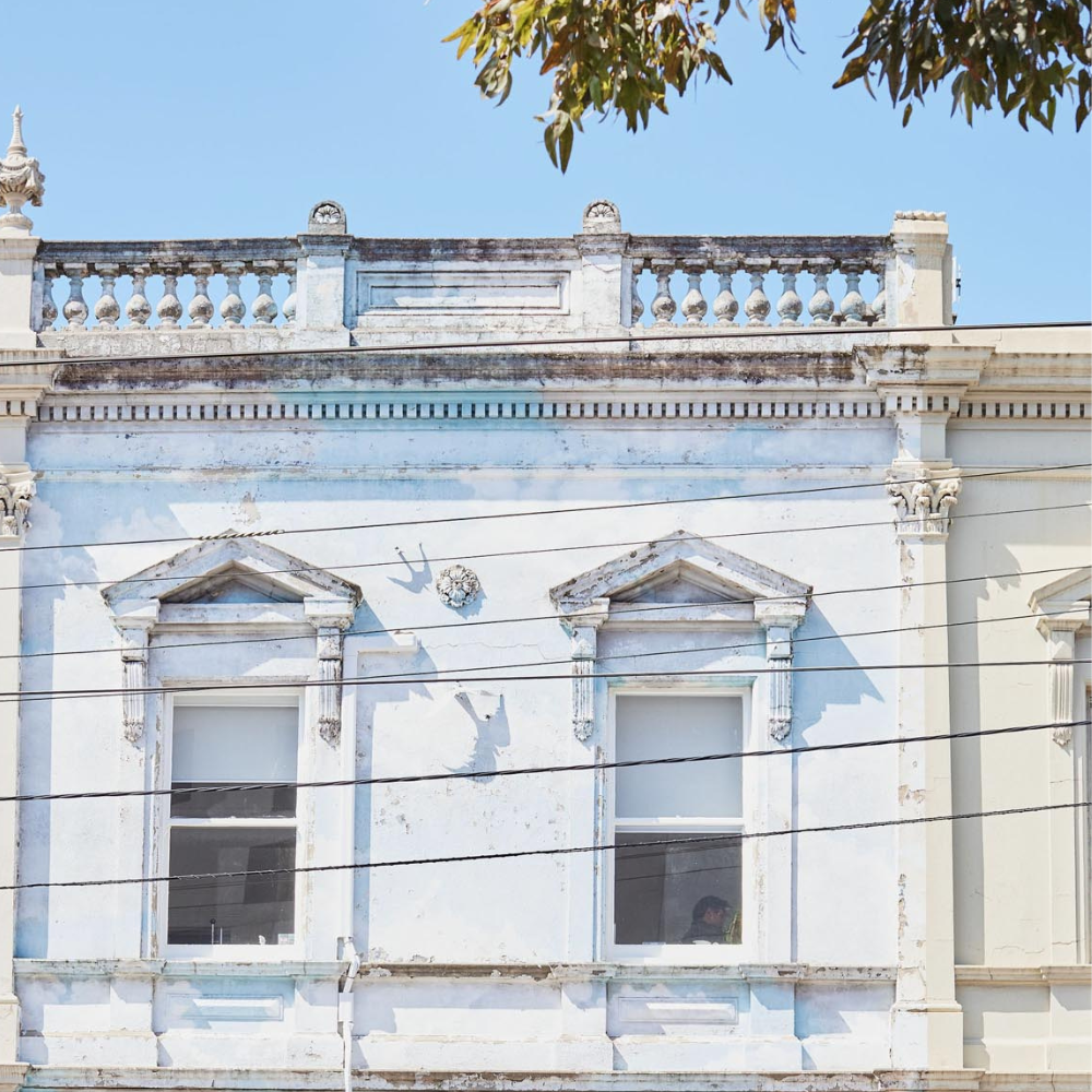 White building facade with decorative elements in collingwood