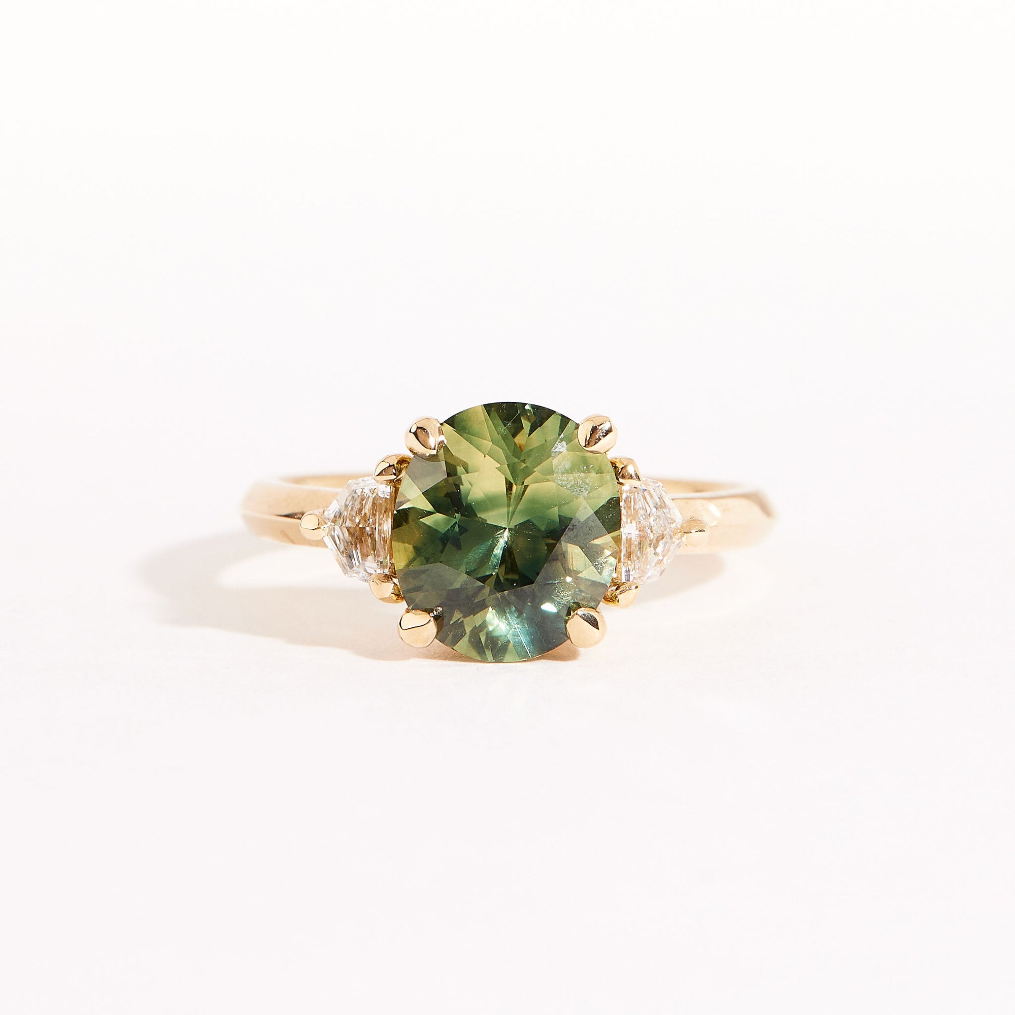 Three stone sapphire and diamond ring
