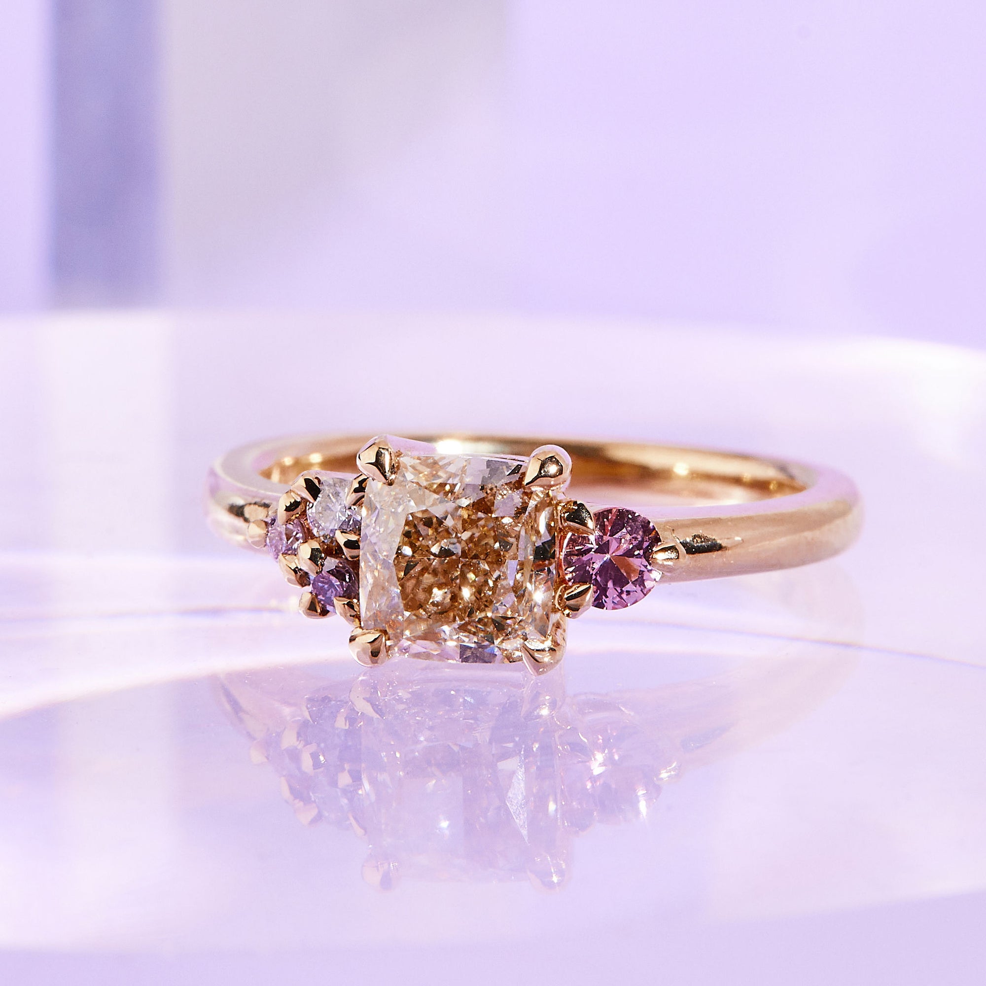 Princess cut champagne diamond and pink sapphire cluster ring