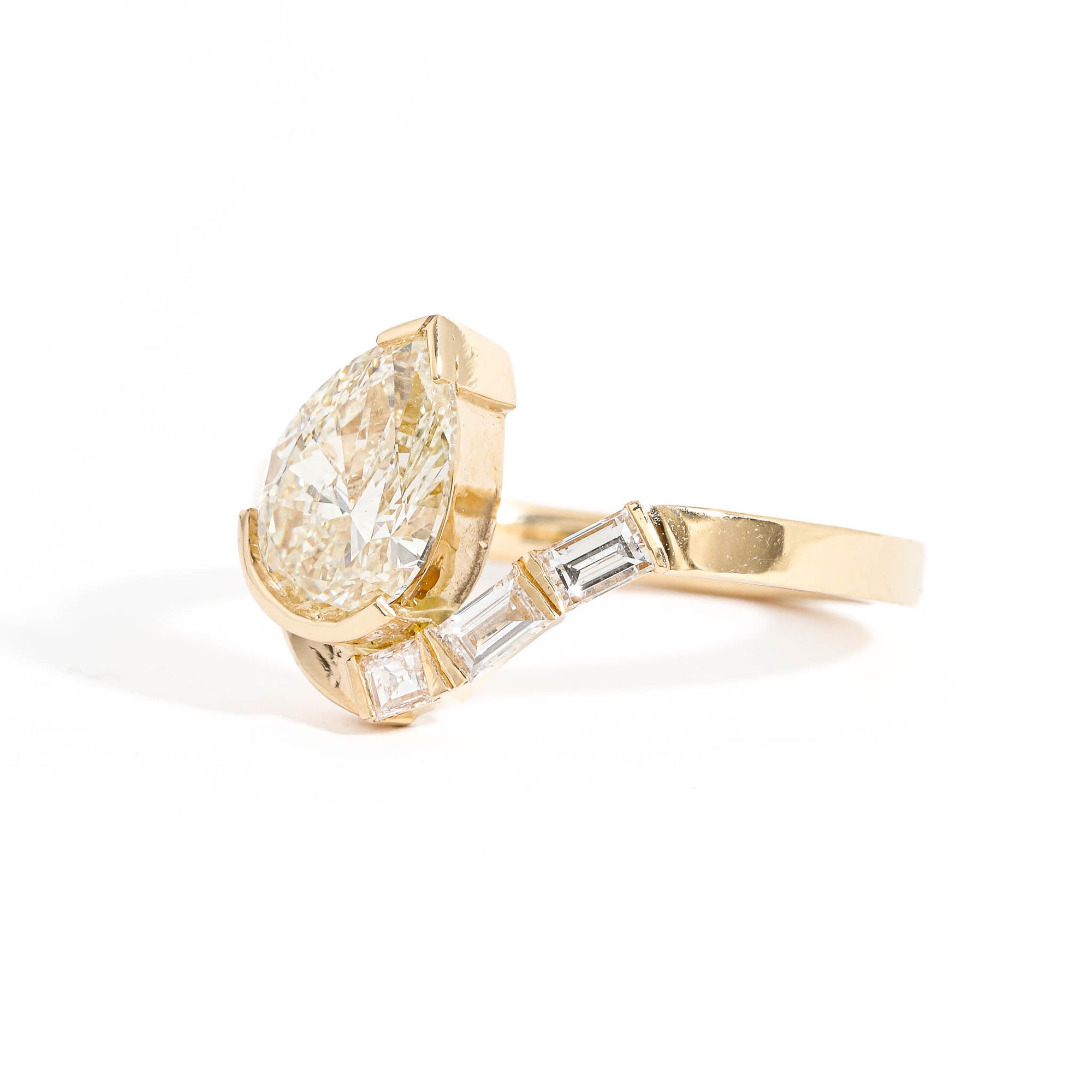  Pear Cut and Baguette Cut White Diamond Engagement Ring in 18 Carat Yellow Gold
