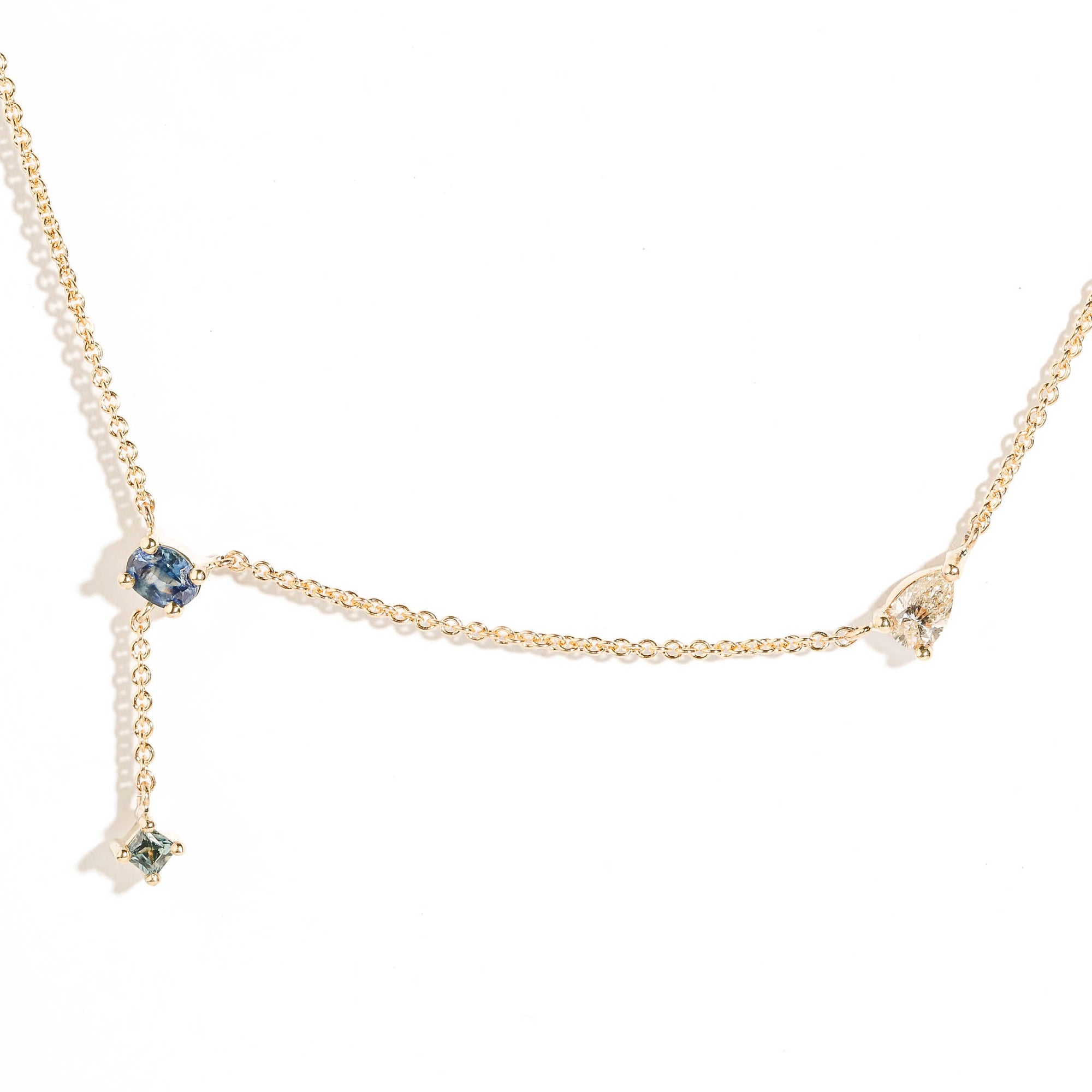 Three Stone Oval Cut Blue Sapphire, Princess Cut Green Sapphire and Pear Cut Diamond Necklace in 9 Carat Yellow Gold