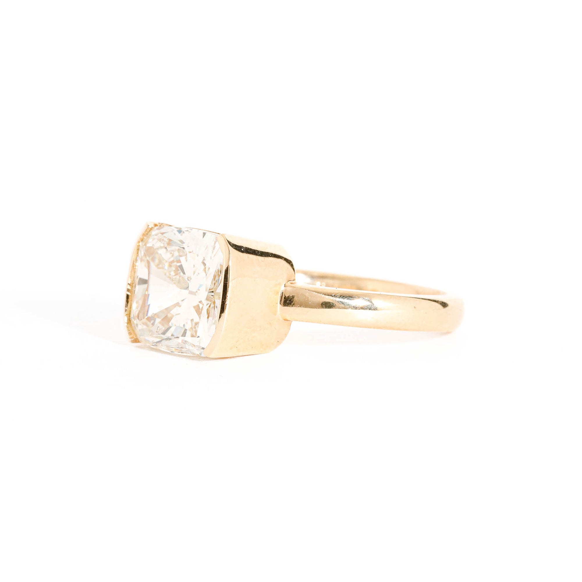 Cushion Cut Champagne Diamond Ring in a Part Bezel Set