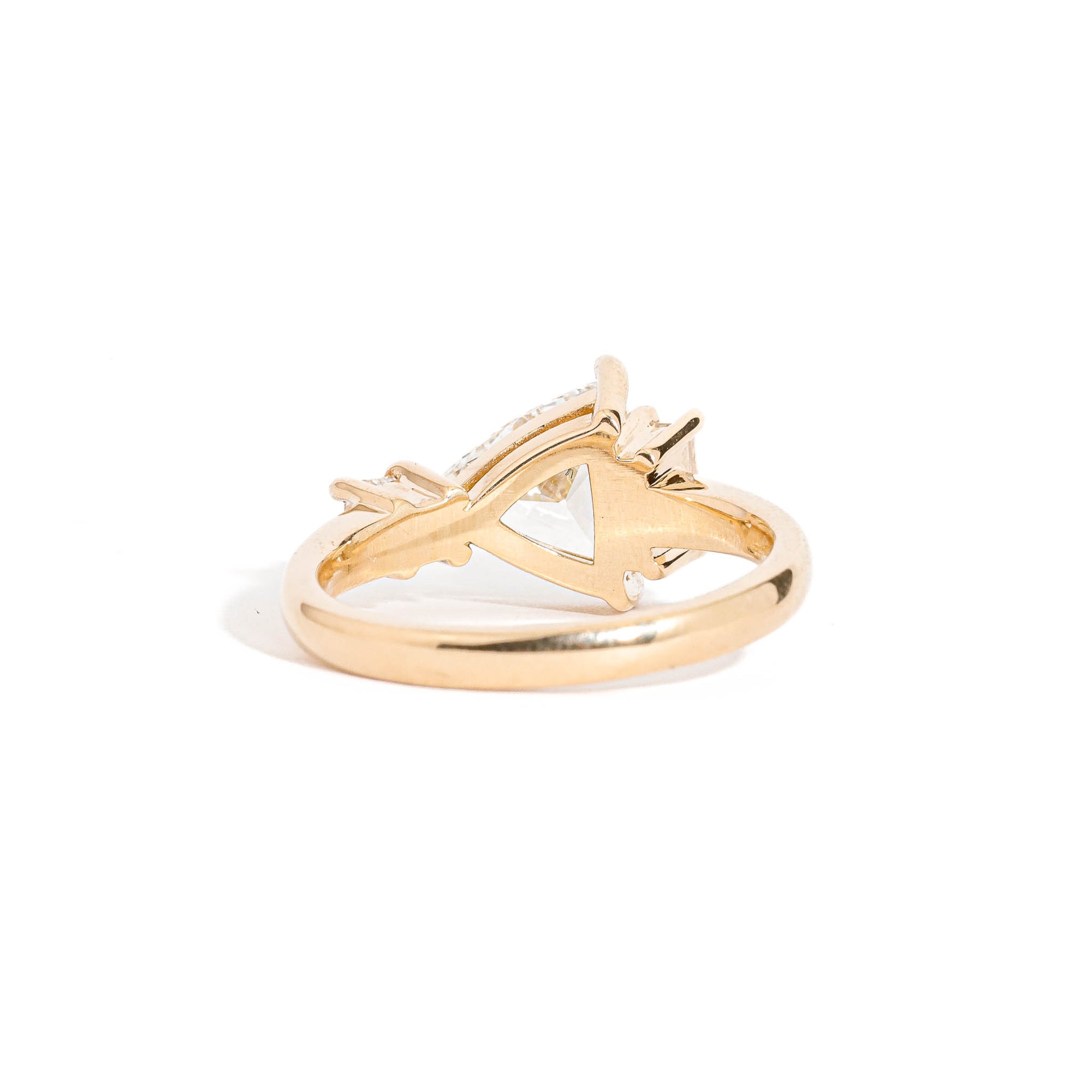 Trillion Cut Diamond Ring with Baguette and Princess Cut Diamond Side Stones in 18 Carat Yellow Gold