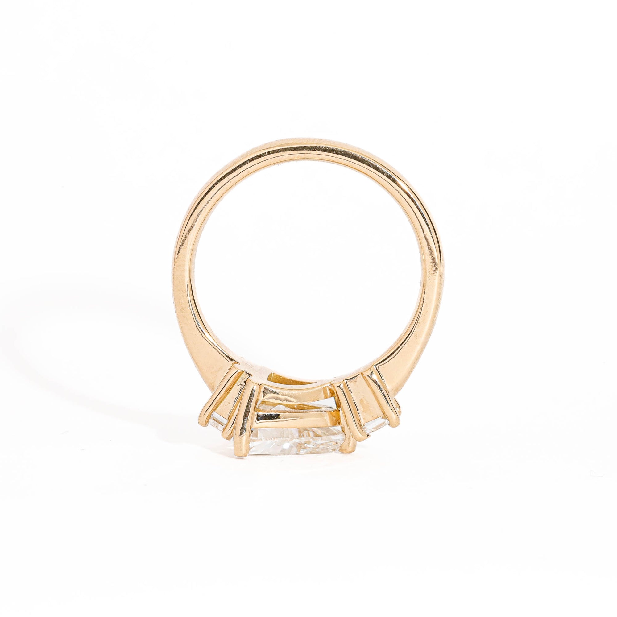 Trillion Cut Diamond Ring with Baguette and Princess Cut Diamond Side Stones in 18 Carat Yellow Gold