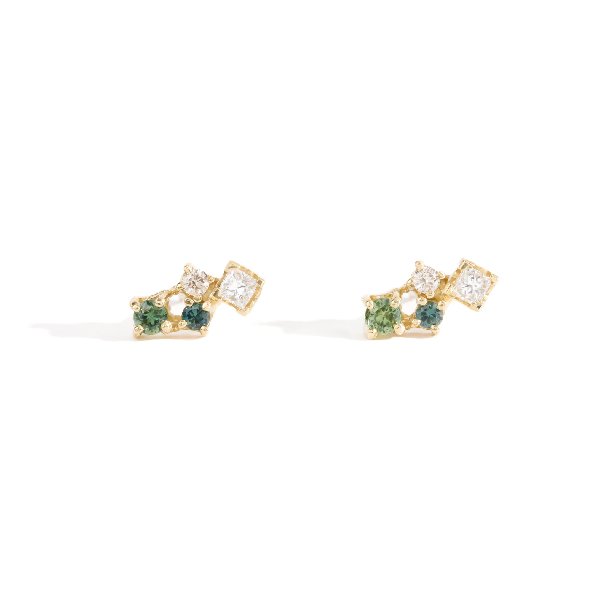 A pair of cluster earring studs with ethically sourced Australian sapphires and diamonds with mixed shapes. Hand crafted in 9ct yellow gold by Black Finch Jewellery