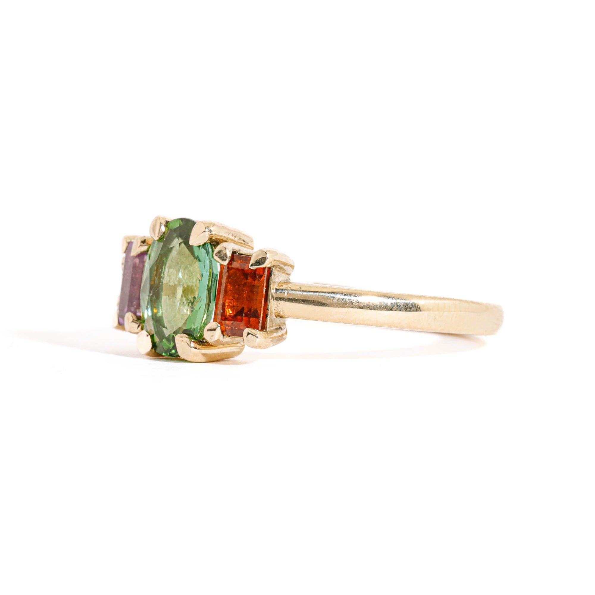 Oval Cut Green Tourmaline, Baguette Cut Orange Sapphire, Round Brilliant Cut Champagne Diamond and Emerald Cut Pink Sapphire Ring in 9 Carat Yellow Gold