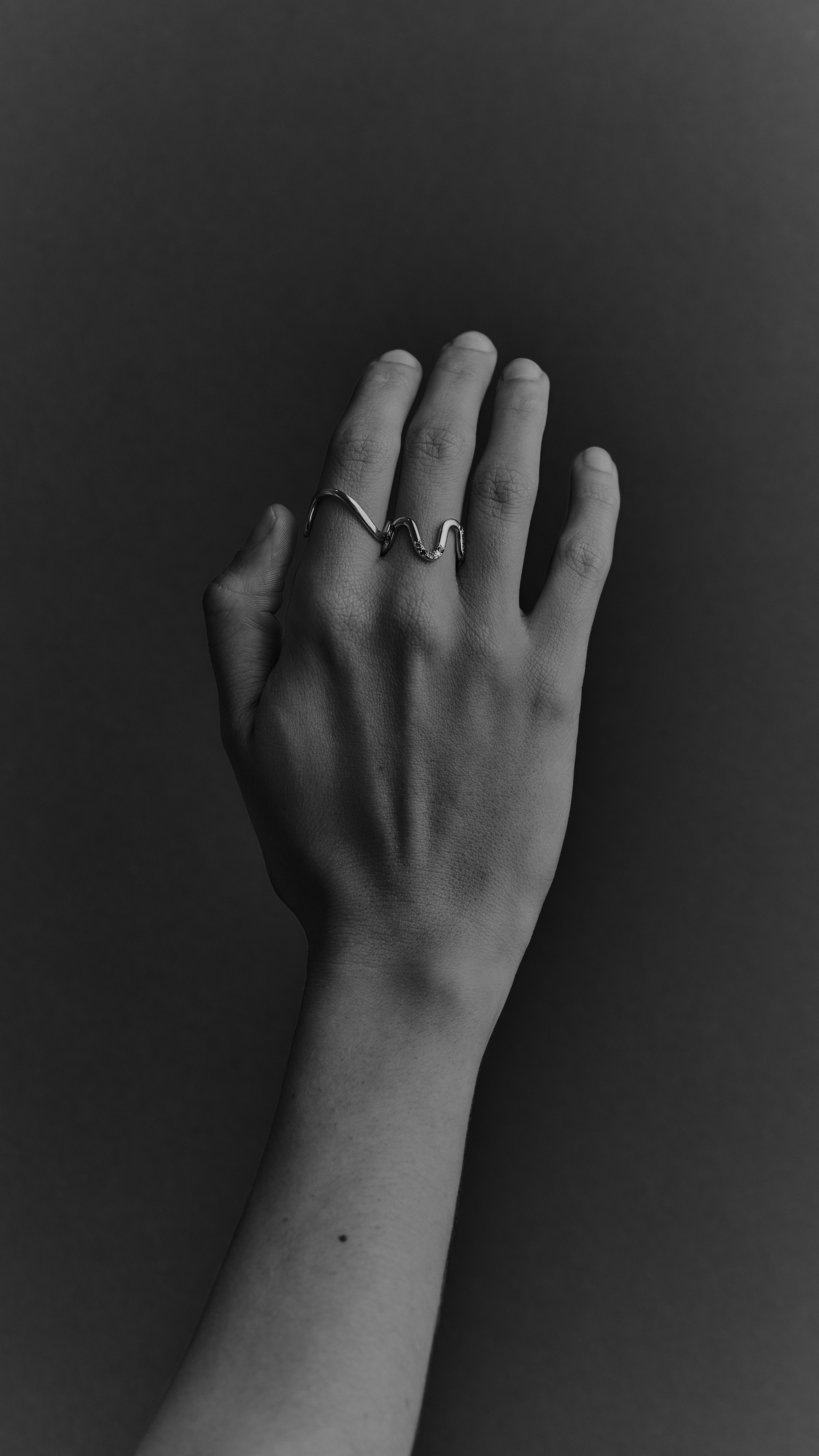 two Solid 18ct Gold curved ring 