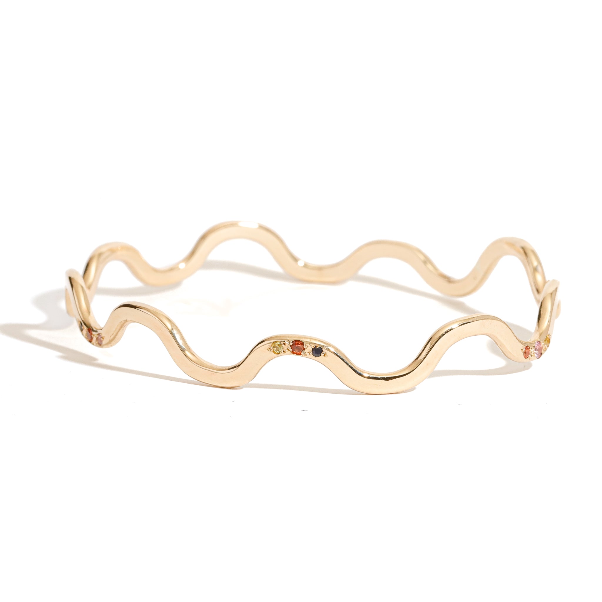 9 carat yellow gold wavy bangle clusters mixed coloured sapphires