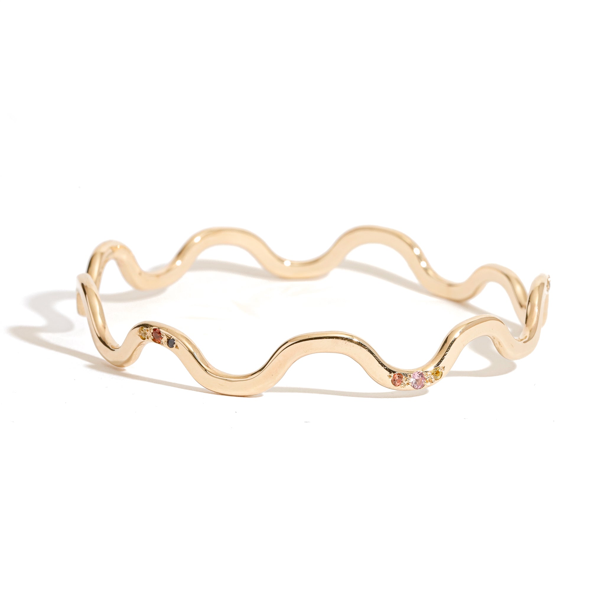 9 carat yellow gold wavy bangle clusters mixed coloured sapphires