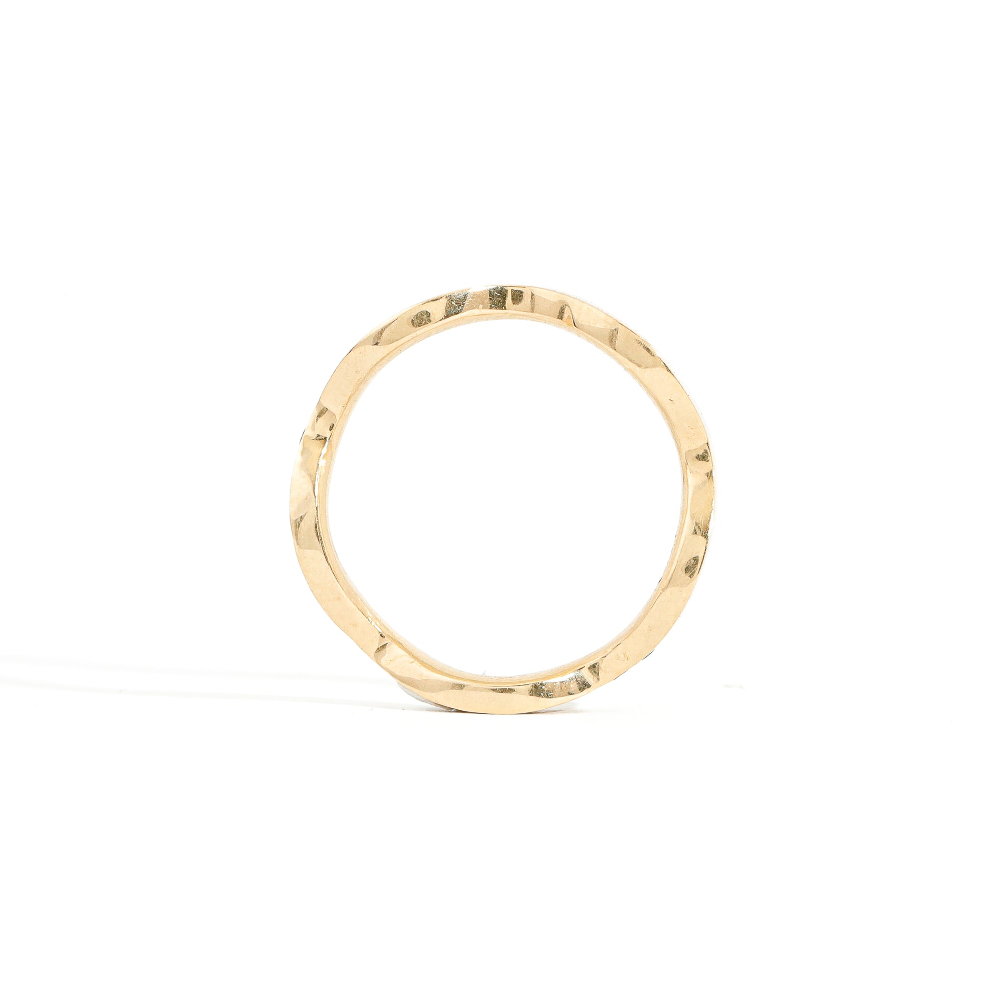 yellow gold 2mm band with nineteen assorted sapphires