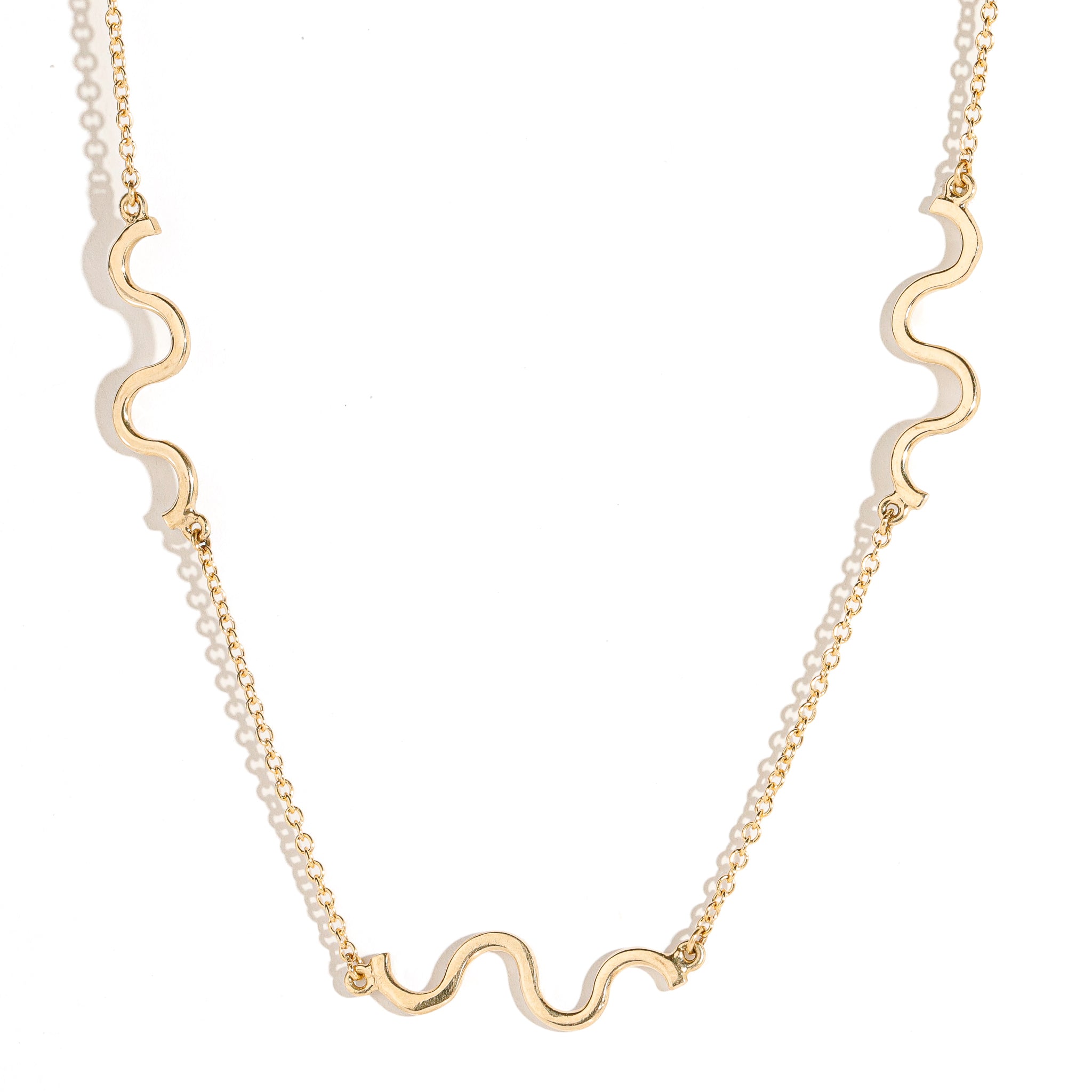 9ct gold fine chain necklace with three solid gold spiral details