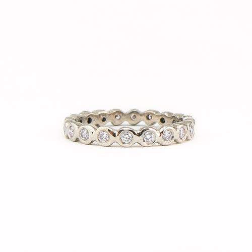 Bespoke 18 carat white gold eternity ring, set with 23 round brilliant cut white diamonds.