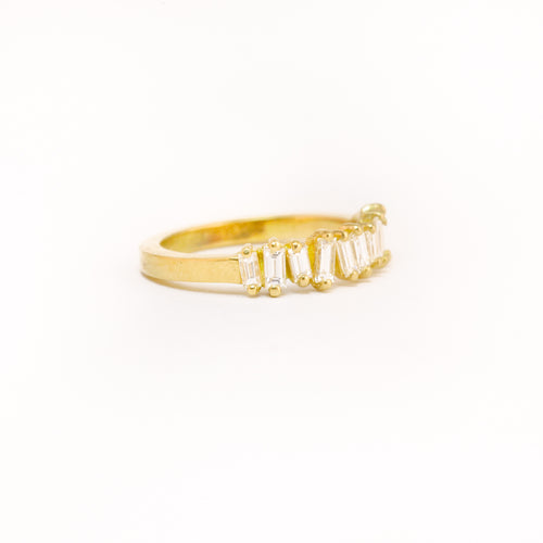 Made in Melbourne, bespoke line up of diamonds in row in an 18ct yellow band. 