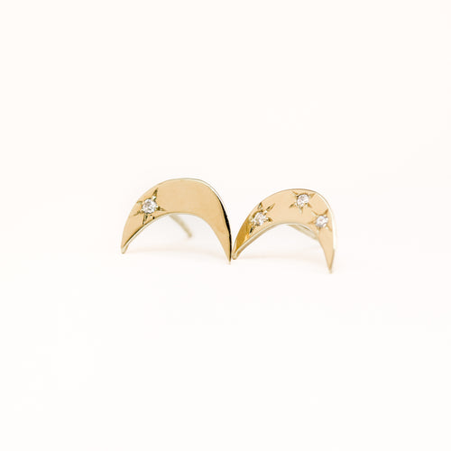 Handmade 9 carat yellow gold moon shaped studs, set with four round diamonds. 