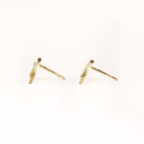 Handmade 9 carat yellow gold moon shaped studs, set with four round diamonds.