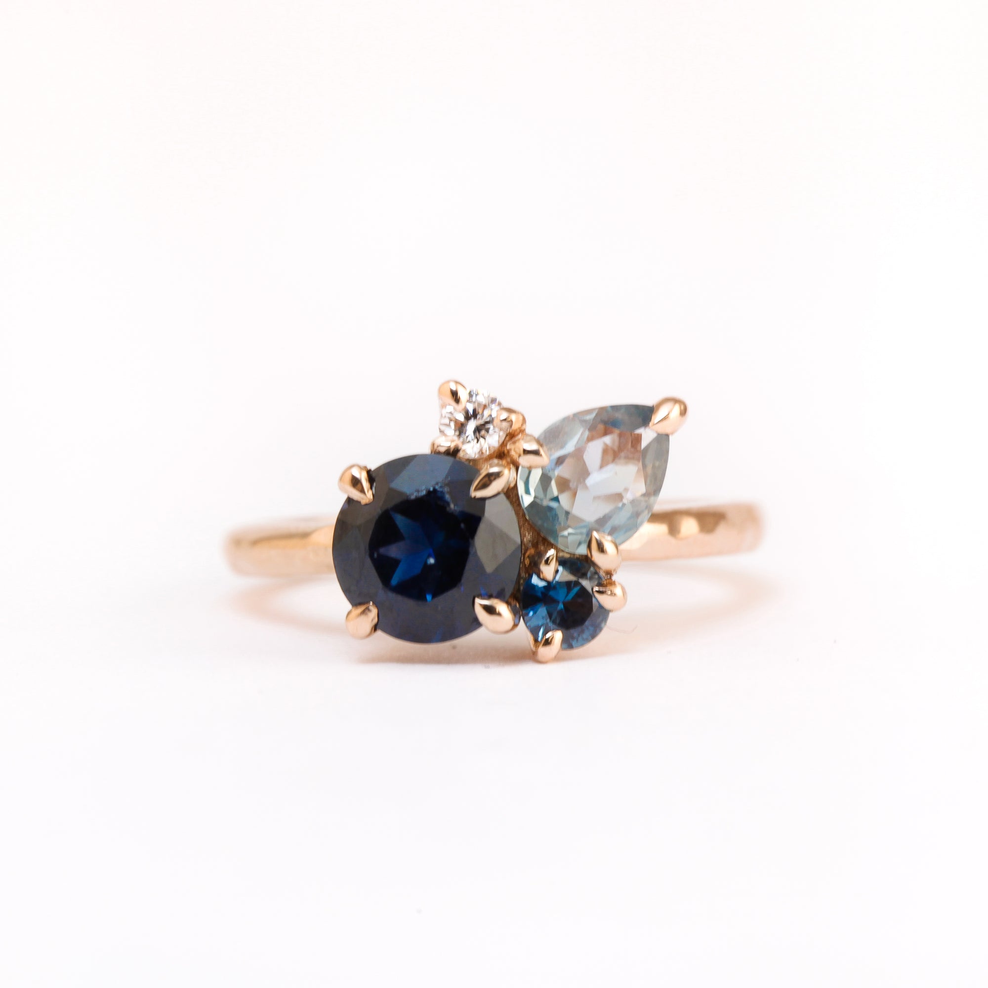 Made in Melbourne, 18ct rose gold ring with a mixture of round and pear cut ethically sourced sapphires.