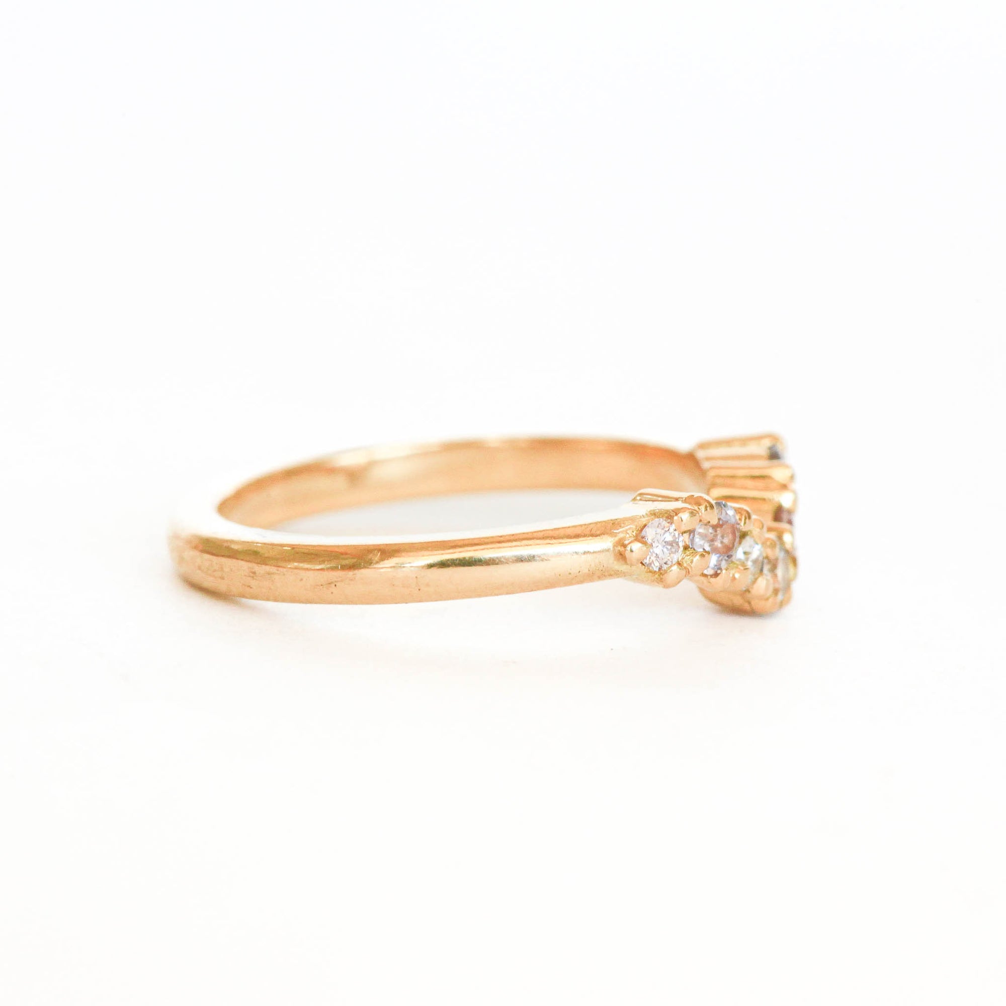 Made in Melbourne, 18ct yellow gold curved engagement ring with a row of diamonds. 