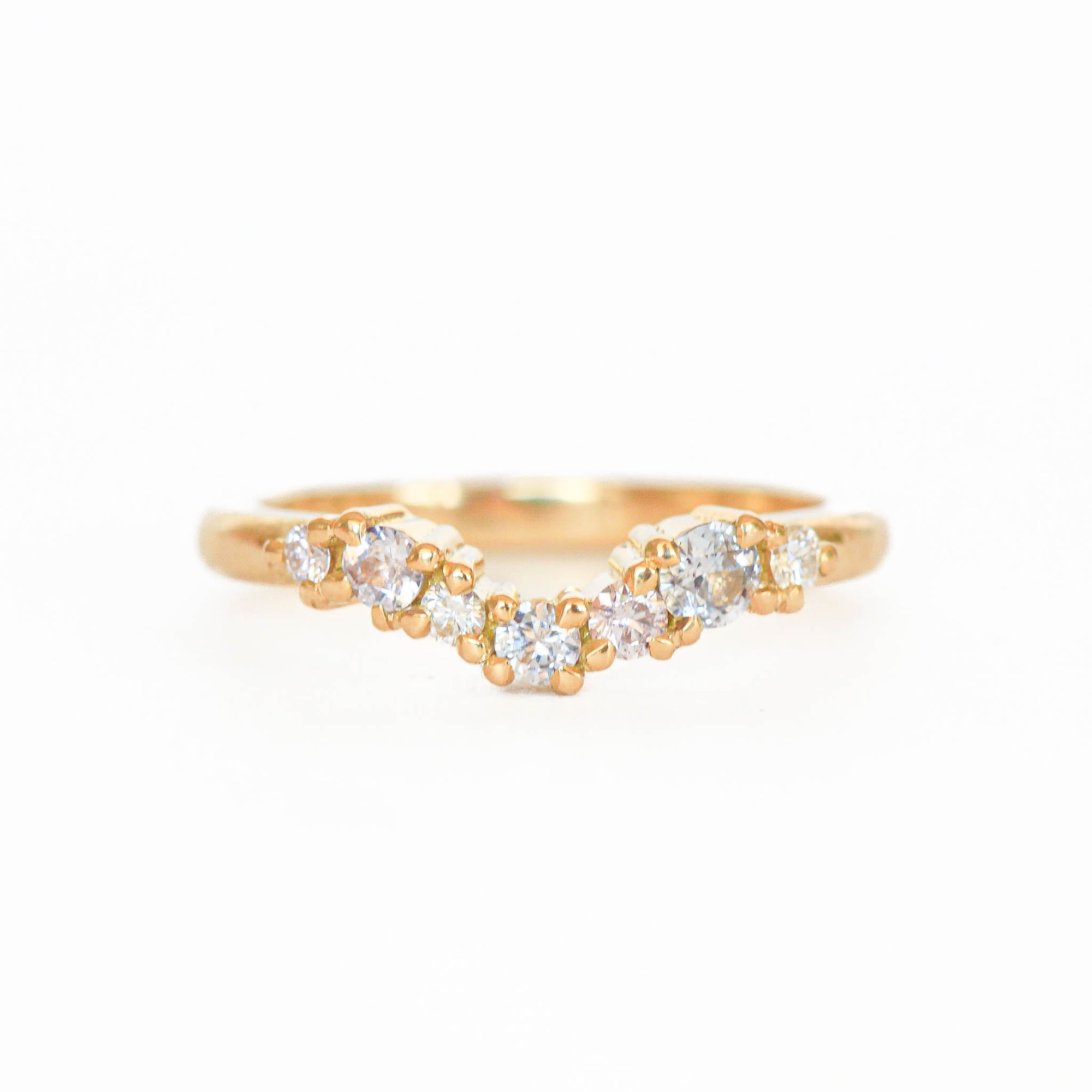 Made in Melbourne, 18ct yellow gold curved engagement ring with a row of diamonds. 