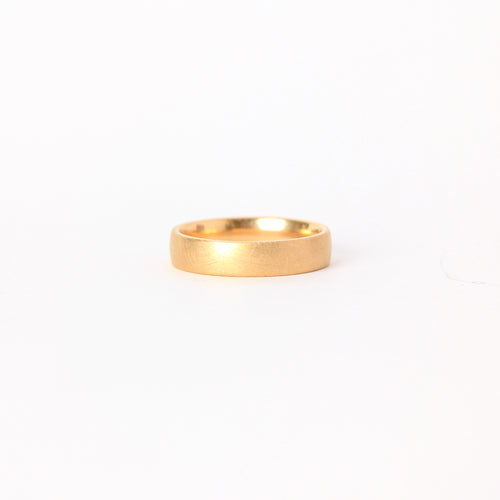 Classic  18 carat yellow gold wedding band with matte, brushed finish.