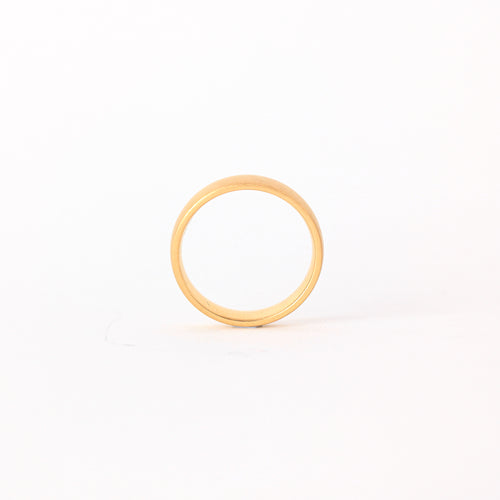 Classic 18 carat yellow gold wedding band with matte, brushed finish.