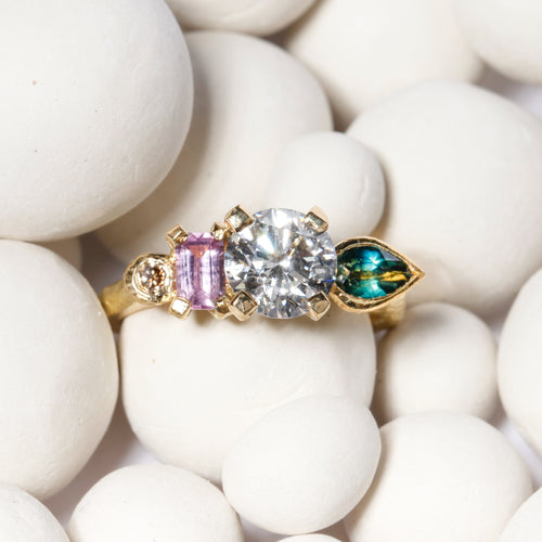Ethically sourced pink and green Australian sapphires with a diamond centred. Featured here in 18ct yellow gold.