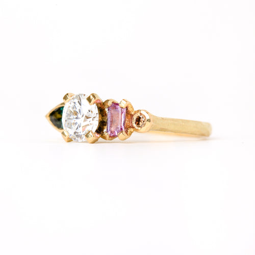 Ethically sourced pink and green Australian sapphires with a diamond centred. Featured here in 18ct yellow gold.
