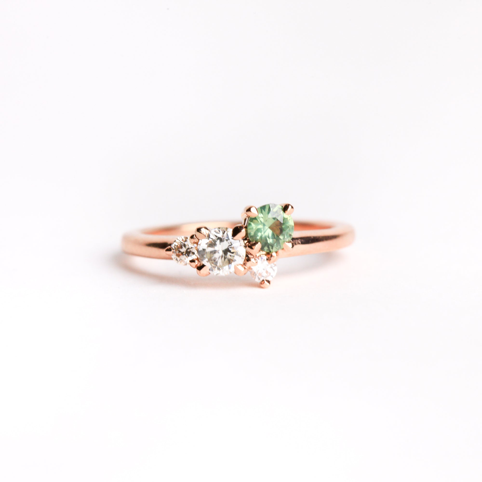 Ethically sourced ethically sourced Australian green sapphire with white and champagne diamond ring with recycled refined 18ct Rose Gold. Bespoke and Handmade by Black Finch Jewellery in Melbourne